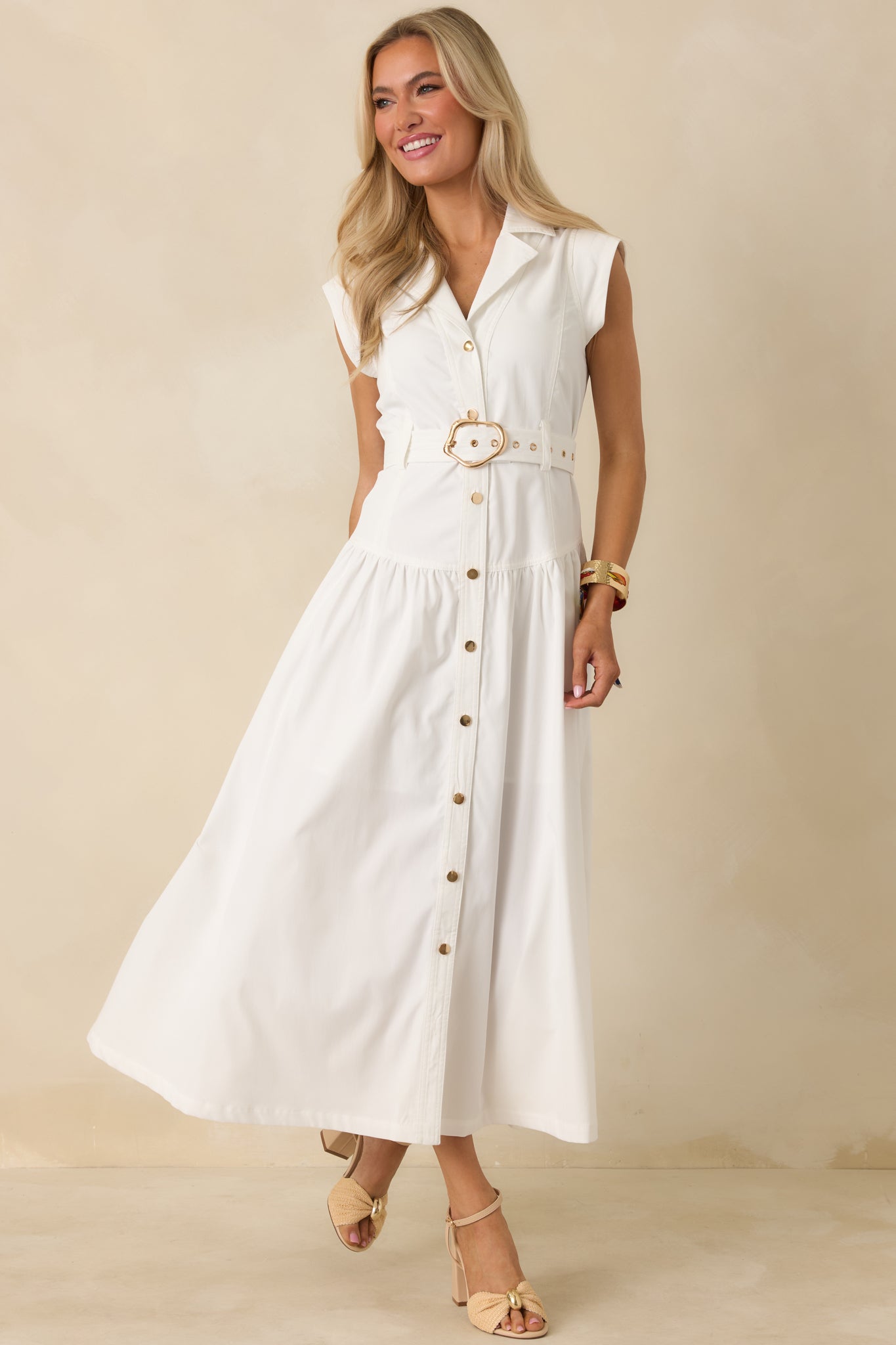 Straight-on front angle showing the crisp collar and clean button placket of the white shirt dress.