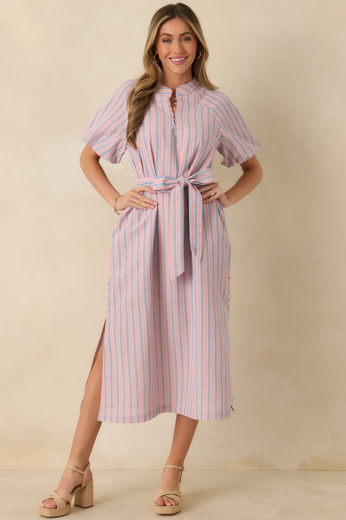 Straight-on front angle showing the soft cotton blend fabric and softly structured silhouette of the striped dress.