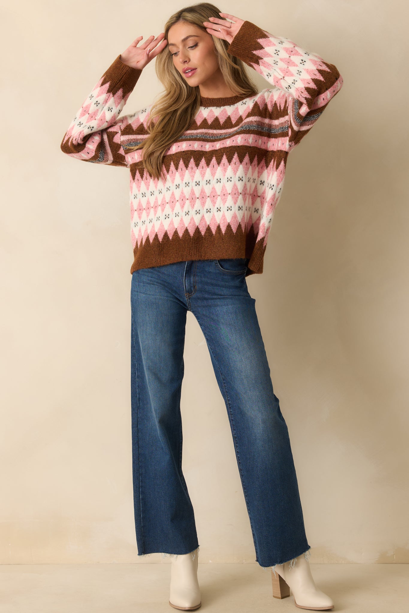 A front-facing angle highlighting the relaxed fit and geometric knit detailing.