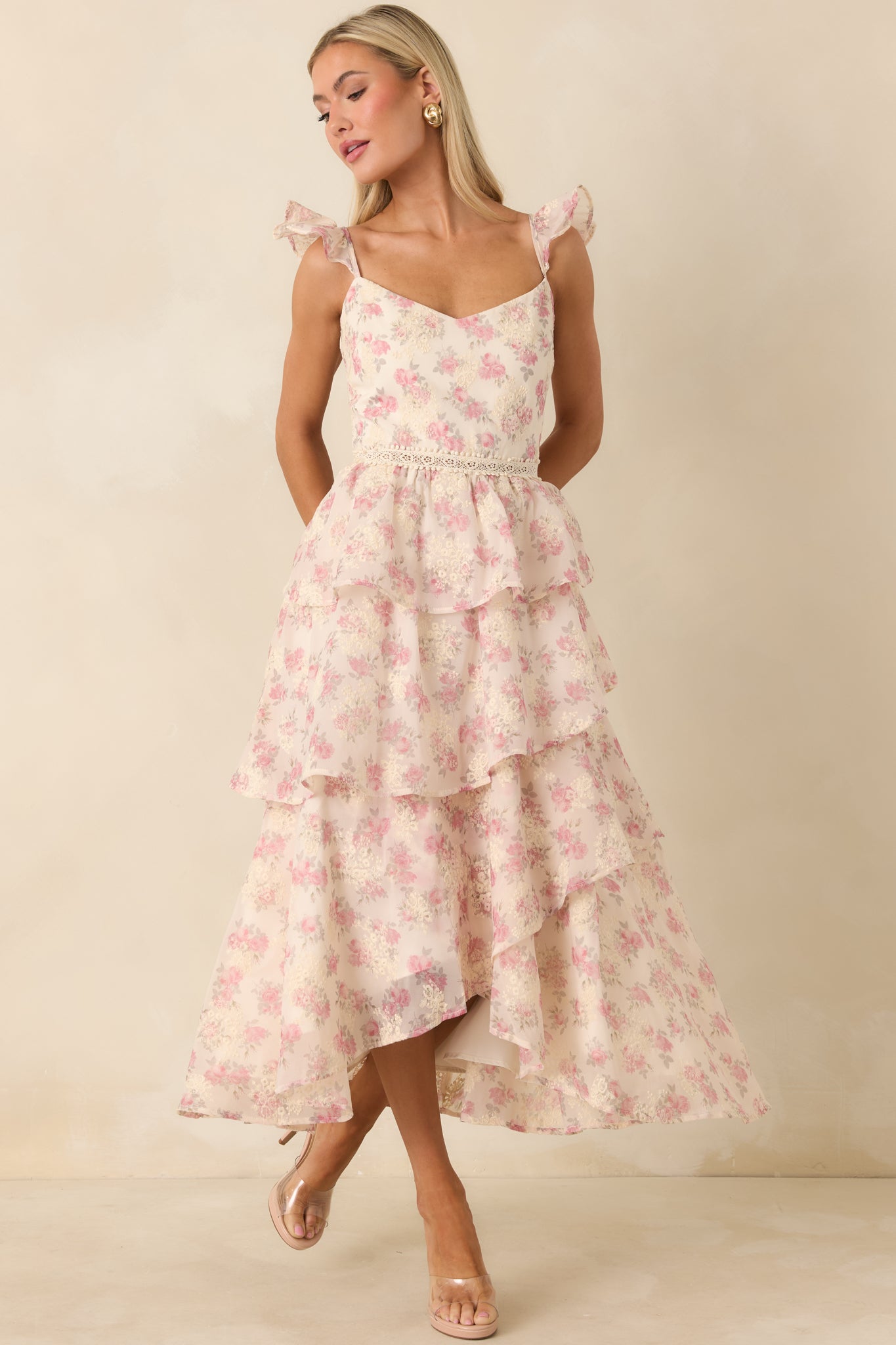 Front-facing full body image focusing on the soft drape and allover floral and embroidery combination.
