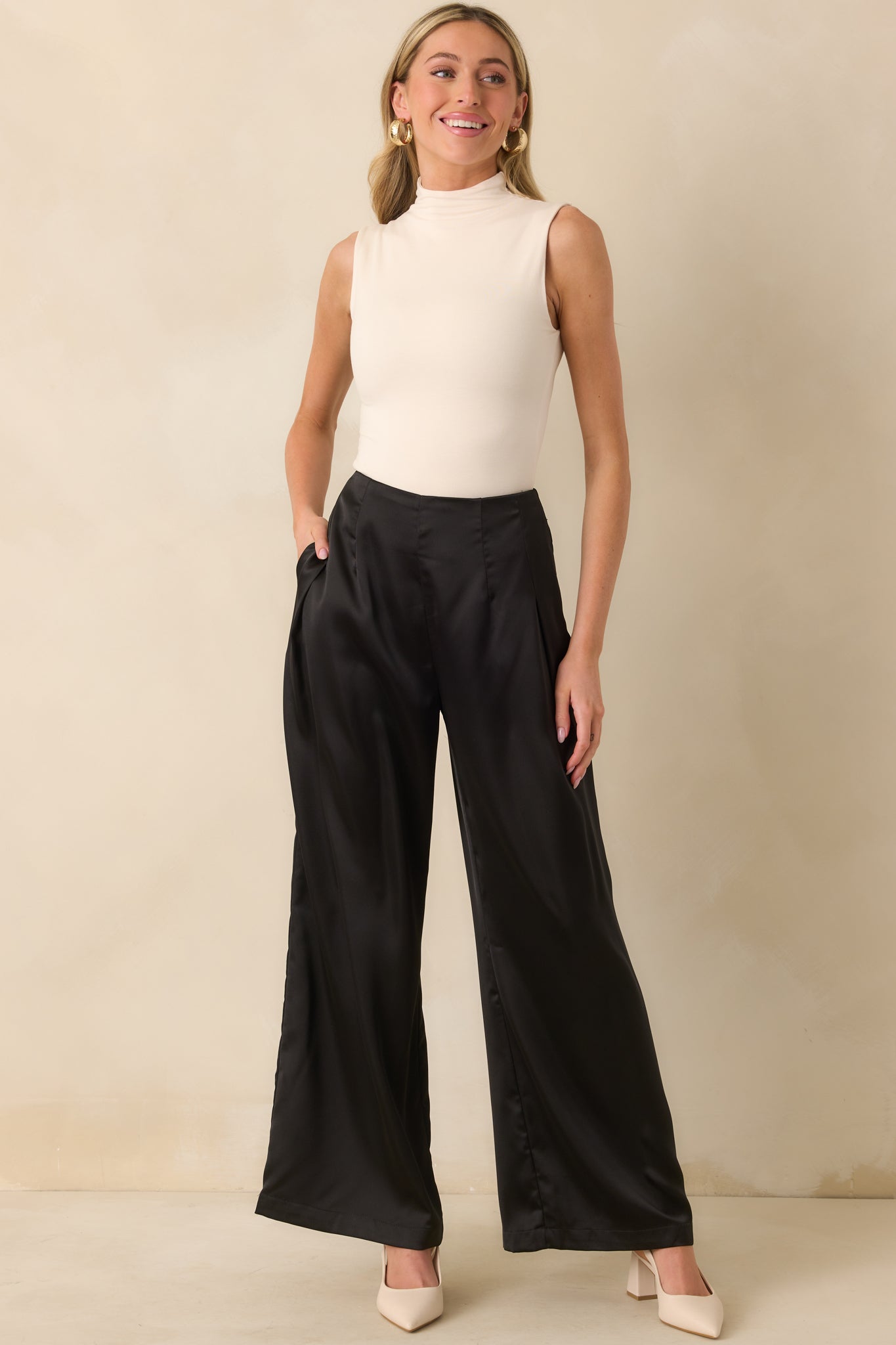 Front-facing full length image highlighting the smooth fabric and sleek design of the bodysuit.