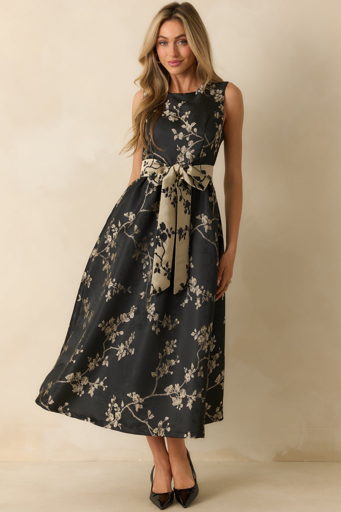 Front-facing full body image capturing the flared skirt and side pocket placement of the midi dress.