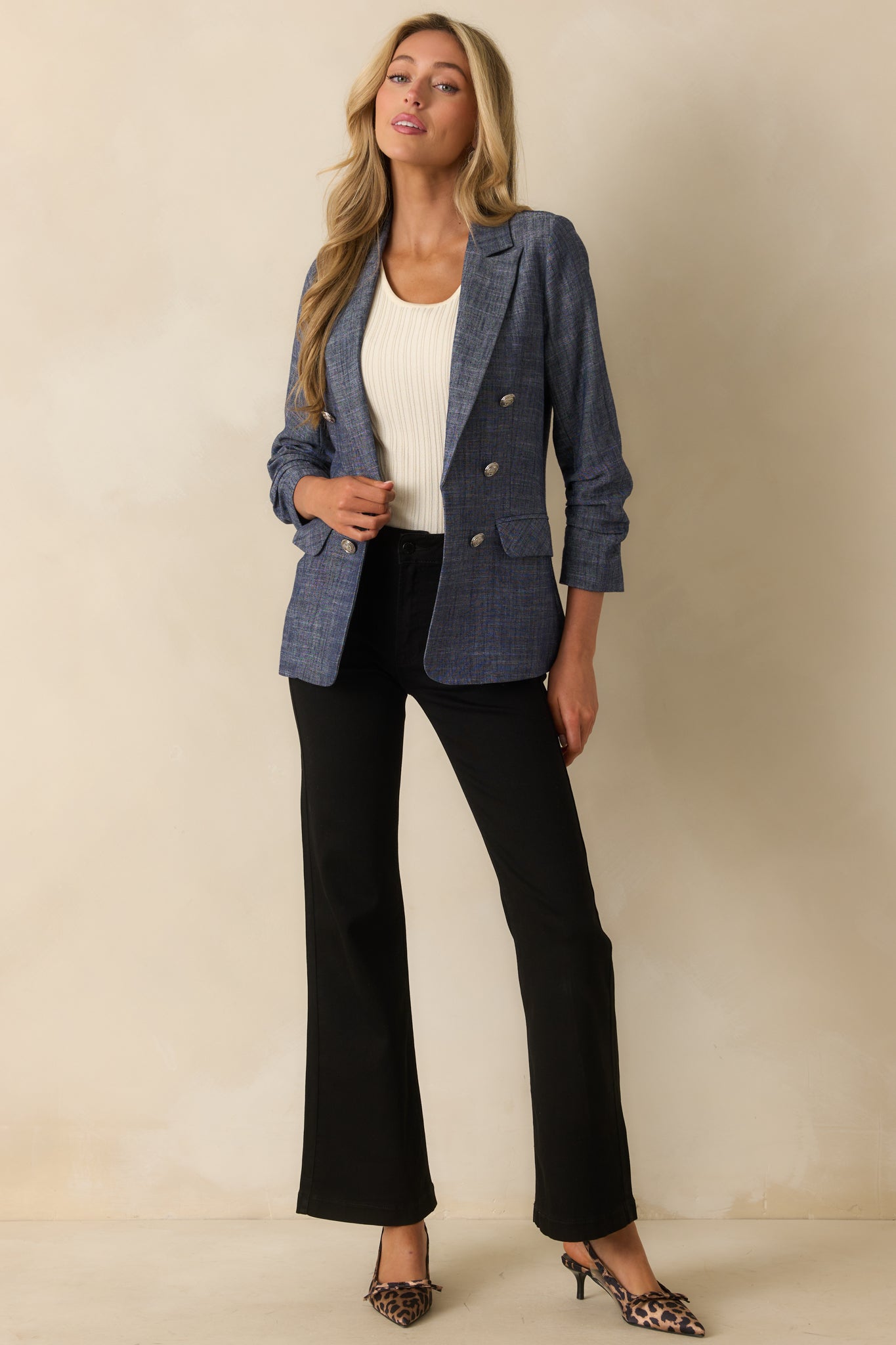 A front-facing image highlighting the decorative front buttons and lightweight fabric.