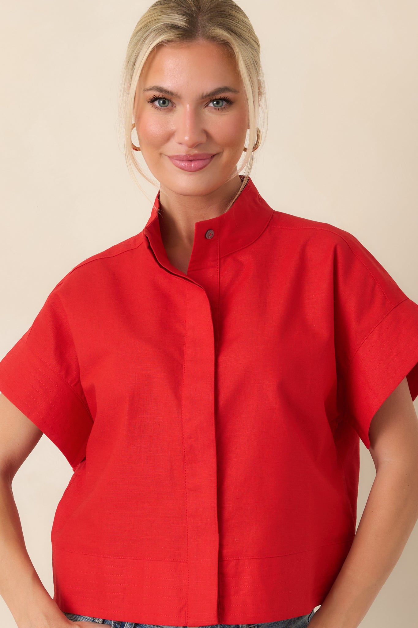 Front panel showing smooth, structured fabric and tailored straight hemline.
