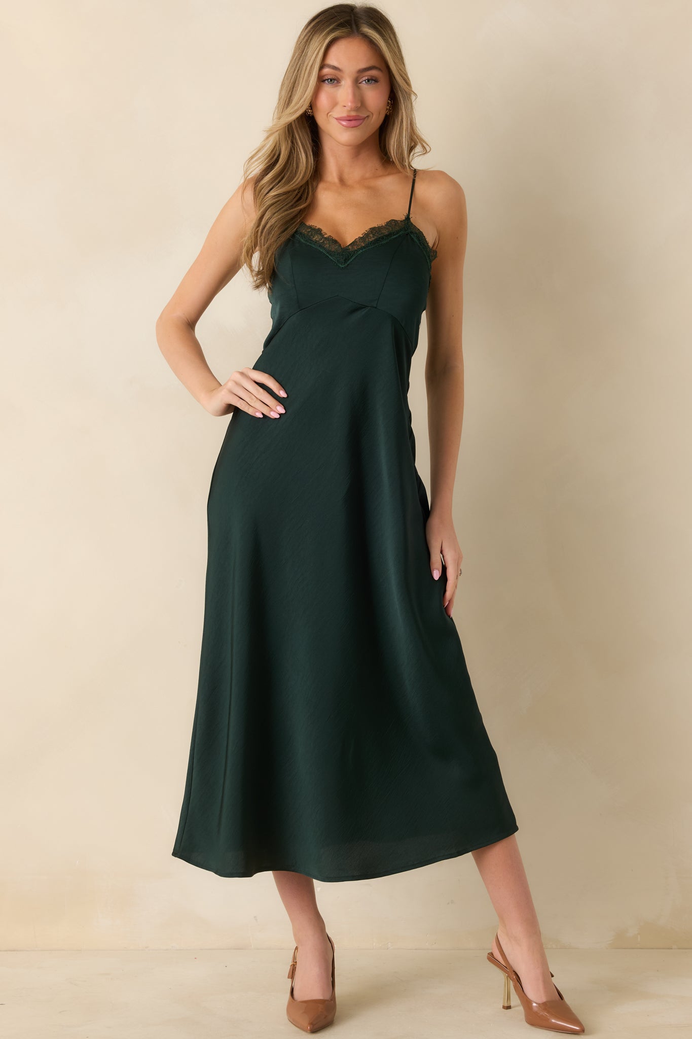 Straight-on front view showing smooth fabric texture and flattering midi-length cut.