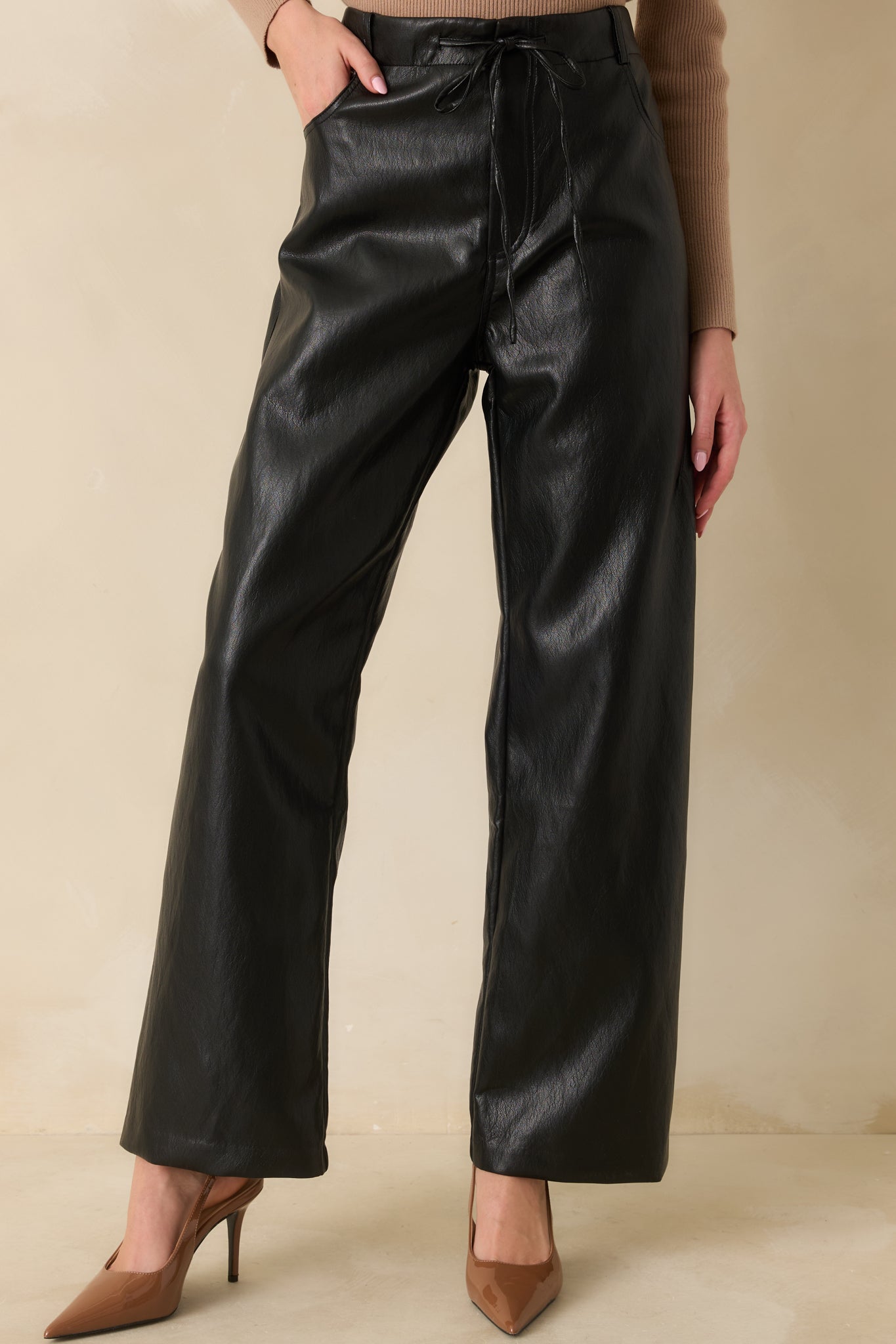 Front view focusing on the elastic high-rise waistband and drawstring detail.