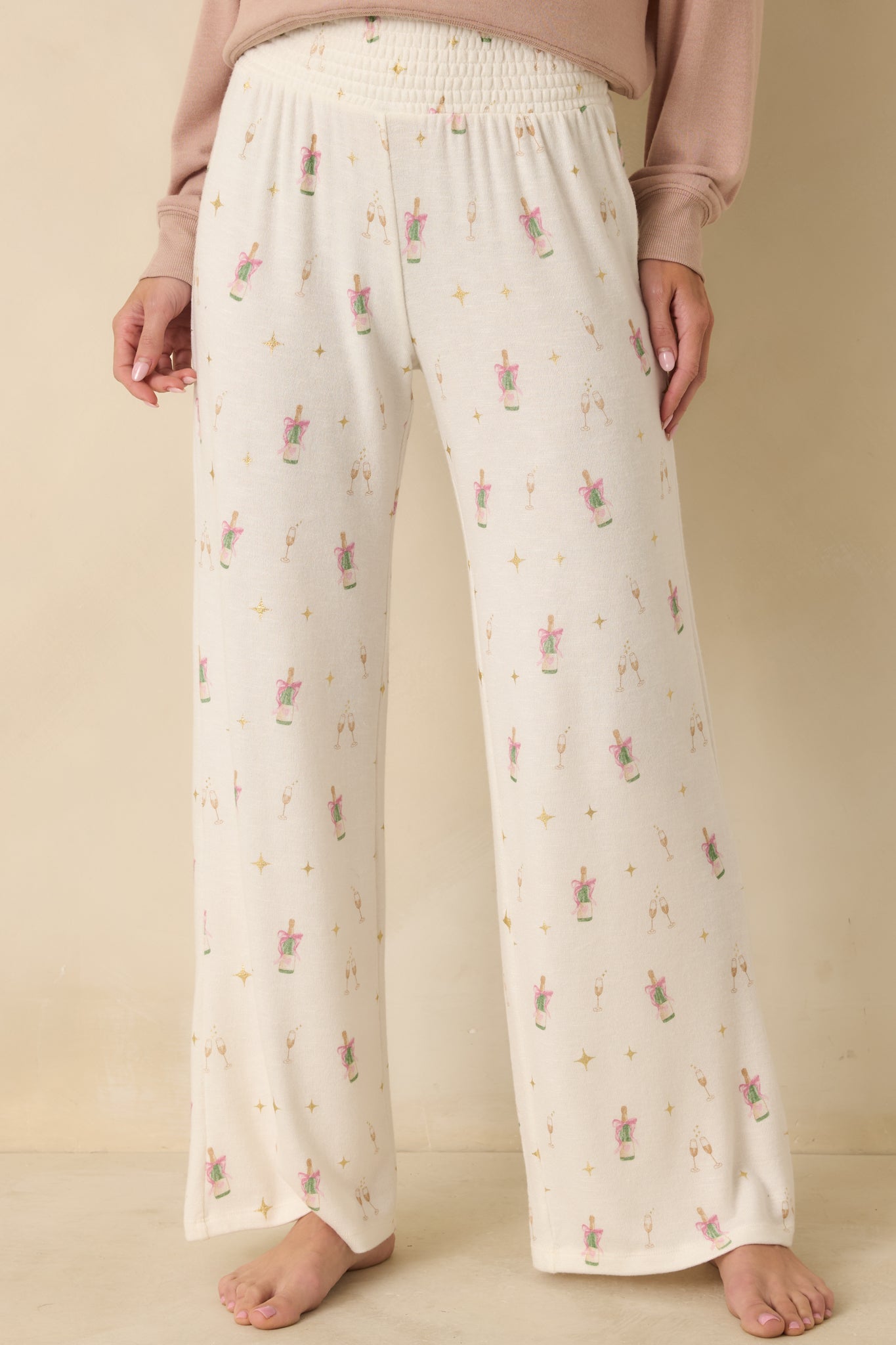 Front view focusing on the elastic smocked waistband and smooth knit fabric.