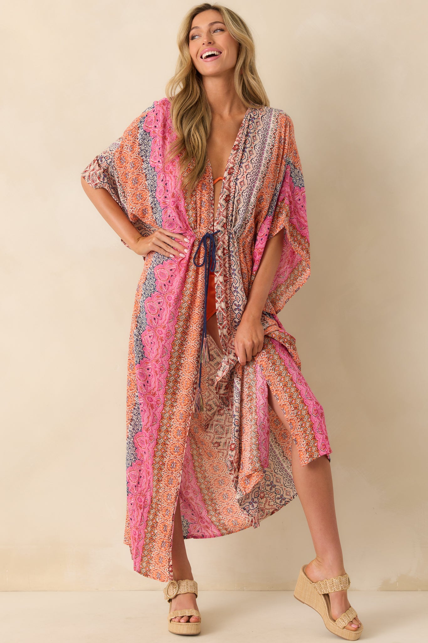 Front view emphasizing the vertical stripe pattern and flowy silhouette with side seam leg slits.