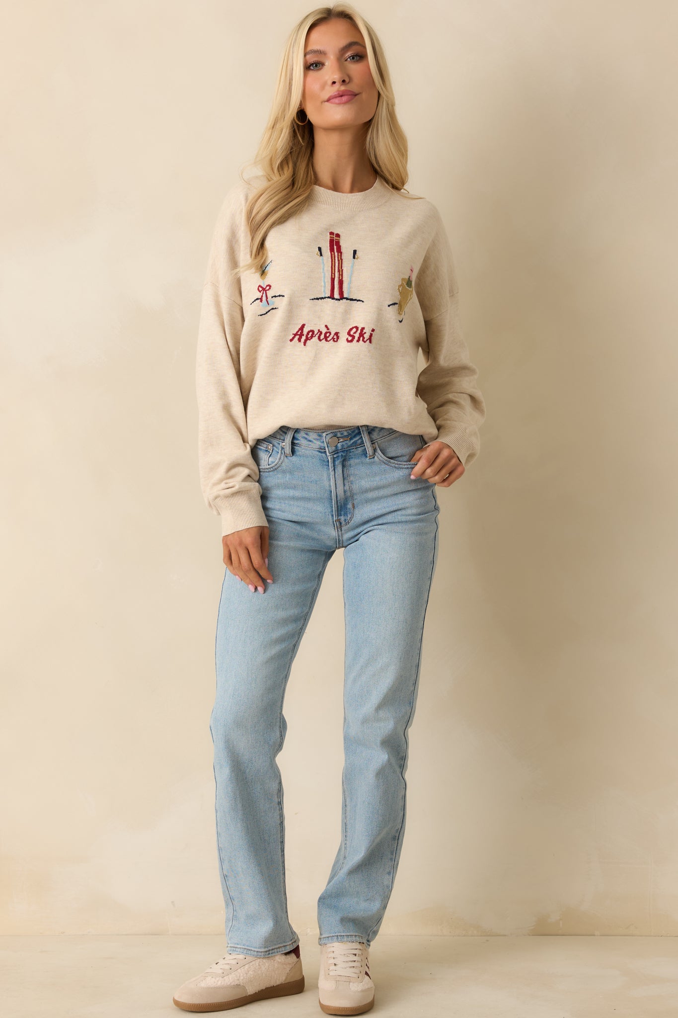 Front view of high-waisted straight leg jeans showing clean silhouette, button and zipper closure, and belt loops.