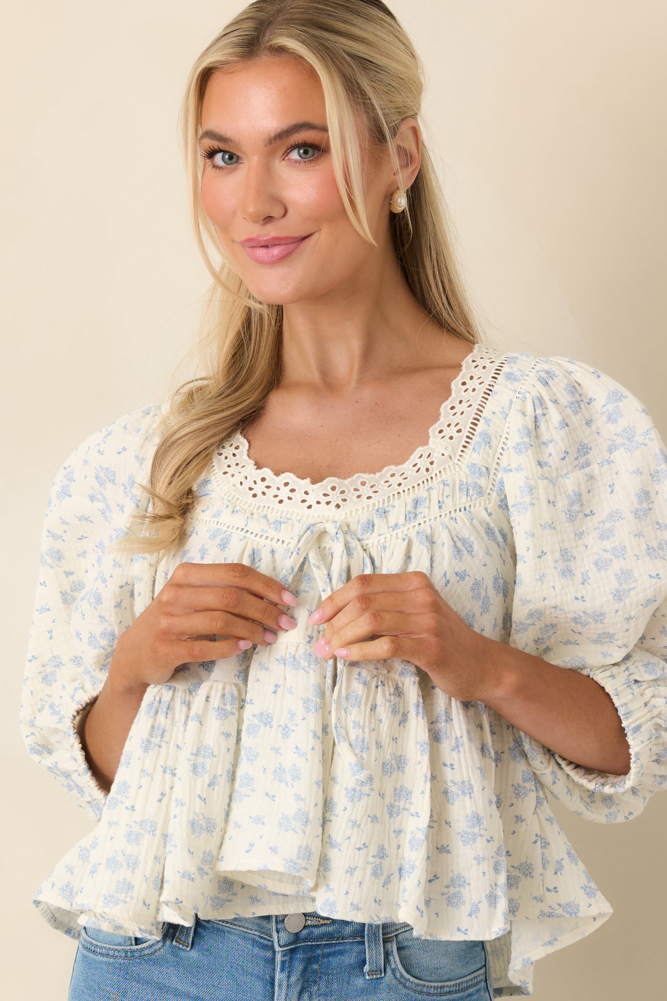 Front view highlighting relaxed silhouette and delicate blue floral pattern.