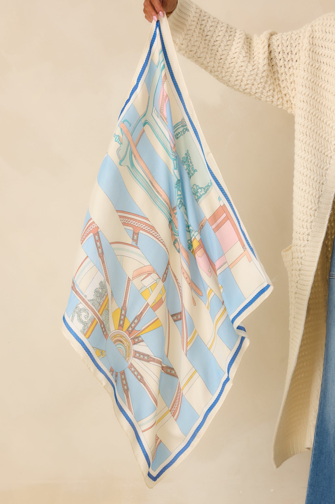 Front-facing full view of scarf highlighting soft hand feel and classic square silhouette.