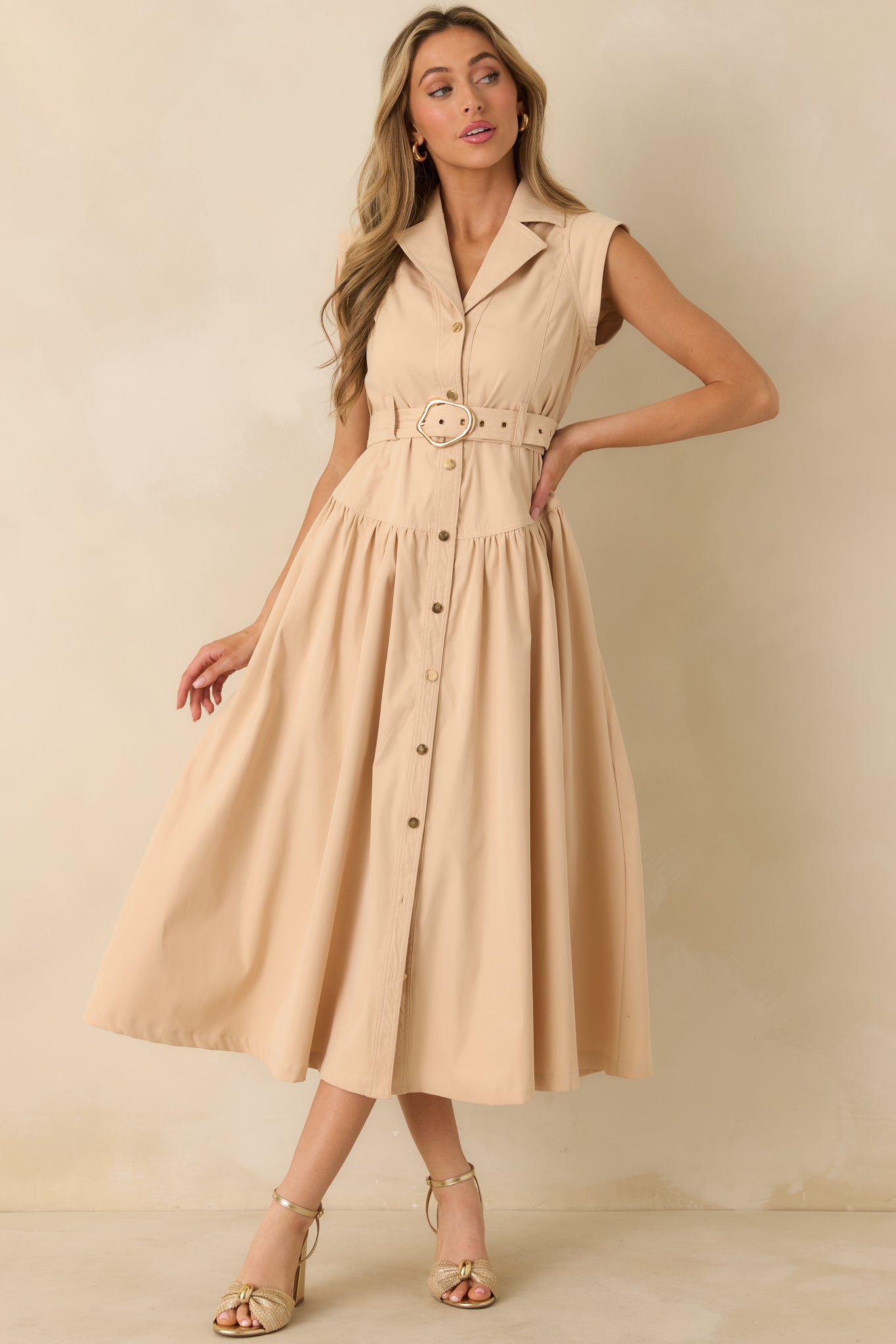 Front-facing full length image highlighting the fitted waist with removable matching belt and gathered midi skirt.