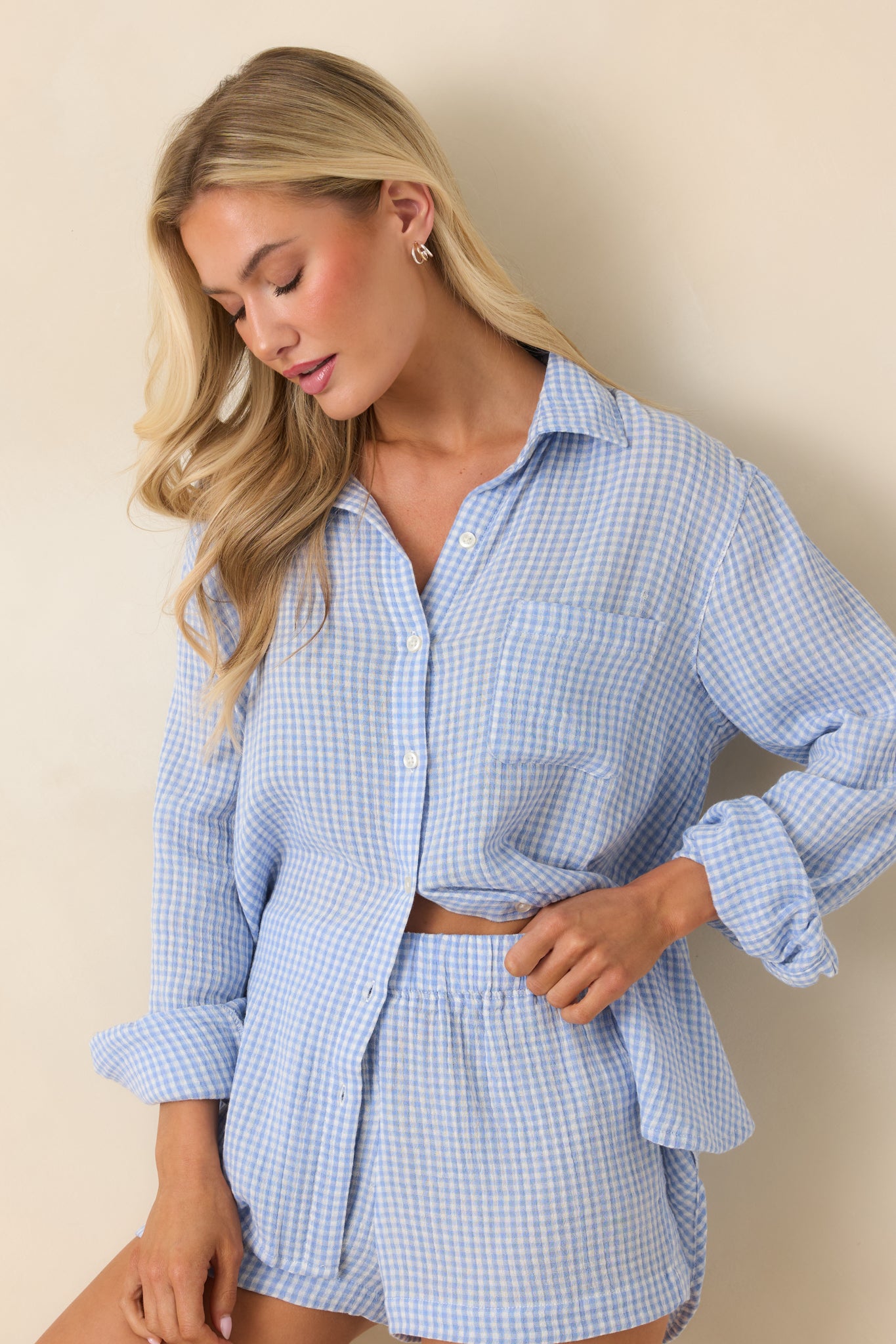 Front view of gingham shirt highlighting chest pocket and buttons.