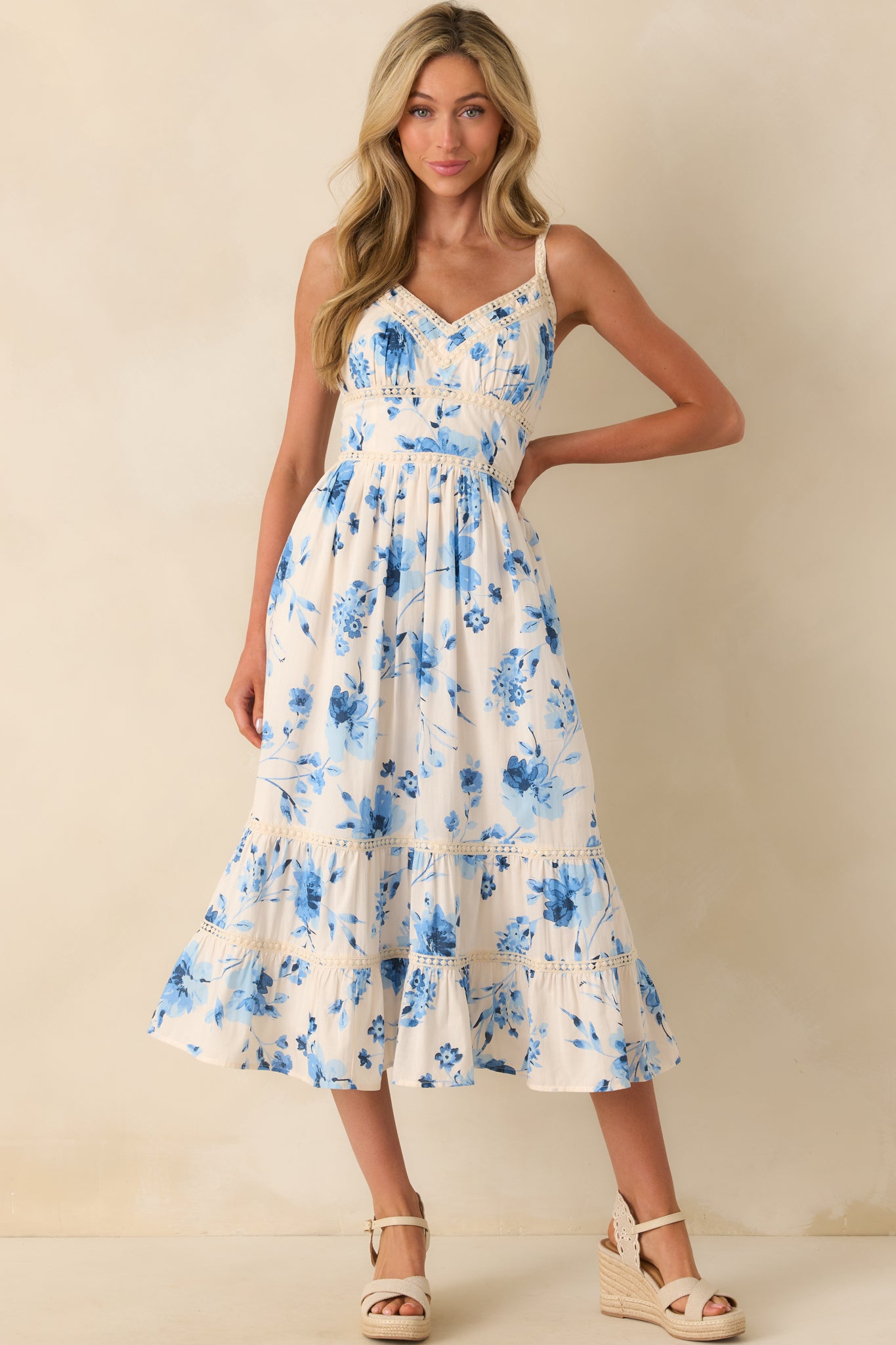 Front view of the dress capturing the embroidered accents and the overall structure of the skirt.