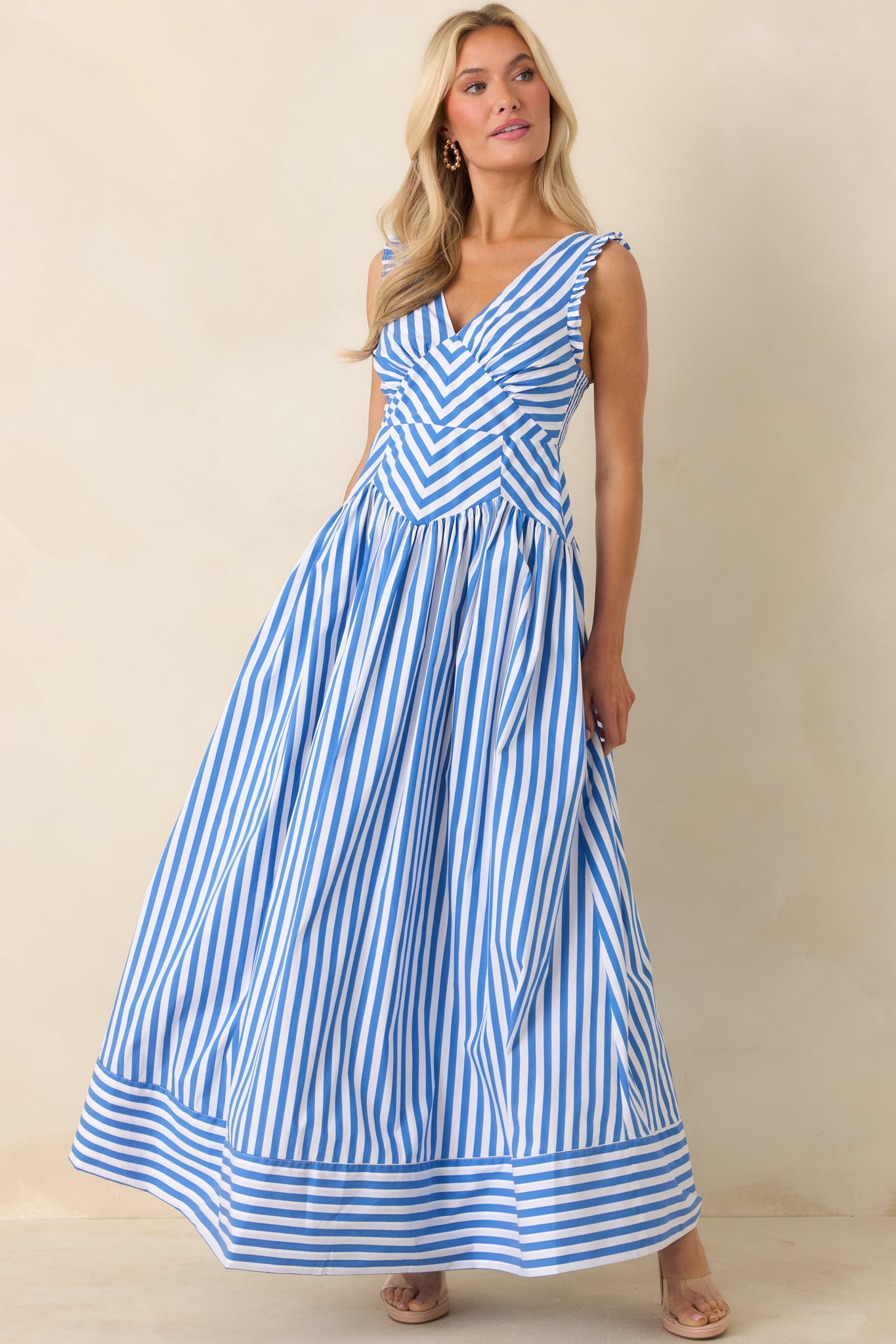 Front view showcasing sleeveless design, stripe contrast, and relaxed drape of the skirt.