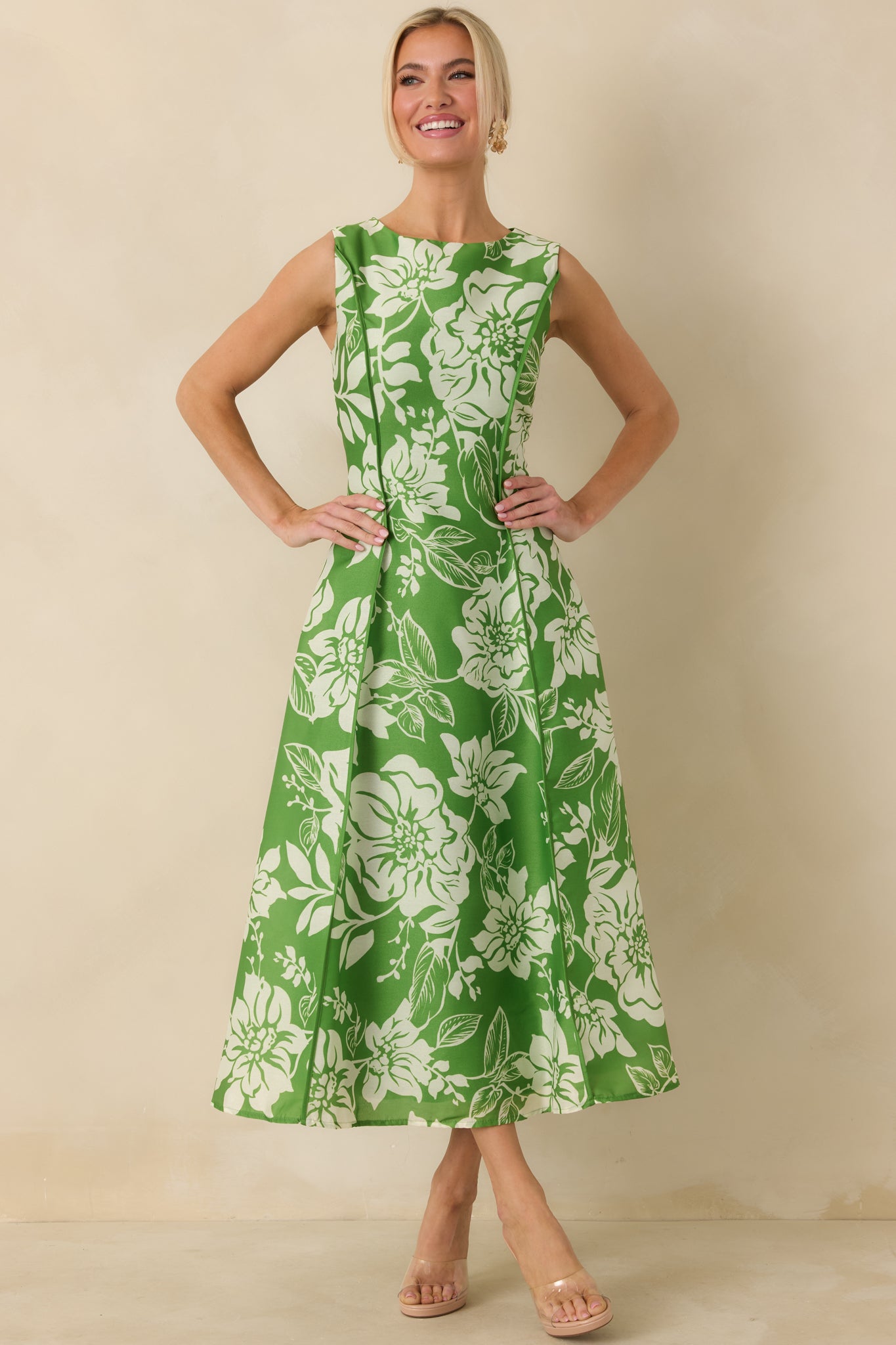 Full-length front view showcasing the tailored bodice, vertical seam lines, and midi-length hem.