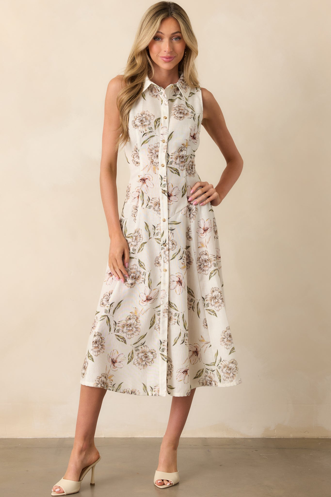 Front view showcasing the vivid floral pattern placement across the bodice and skirt with a softly flared hemline.