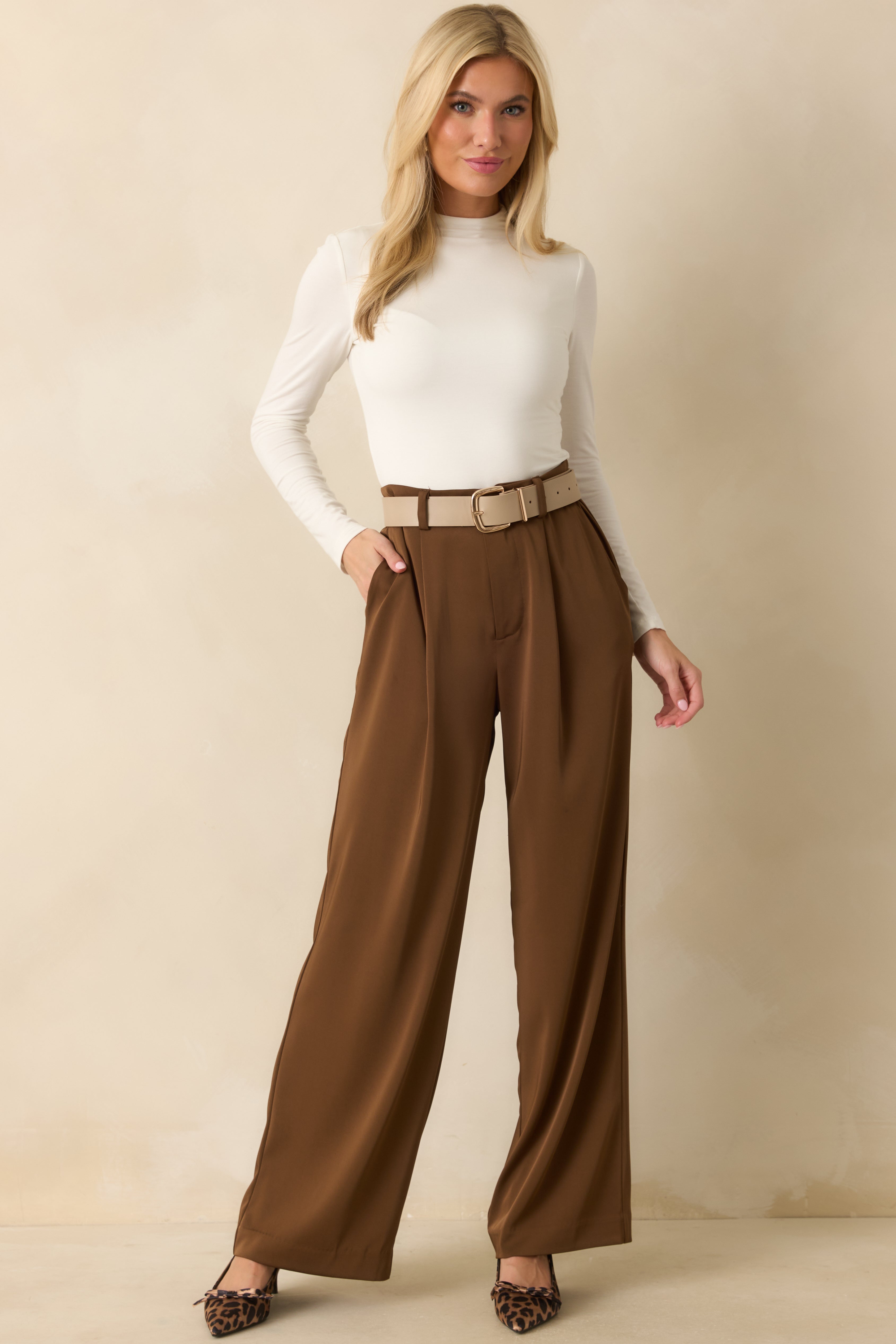 Front-facing view highlighting the smooth fabric and overall streamlined fit of the bodysuit.