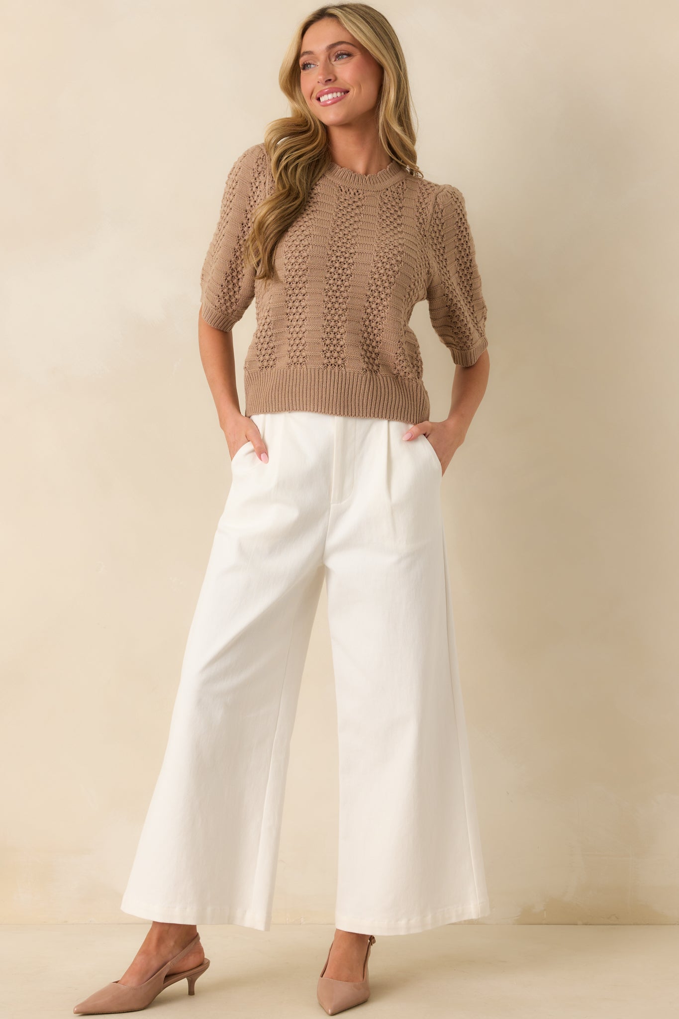 Front view of the top displaying the relaxed fit and ribbed hem details.