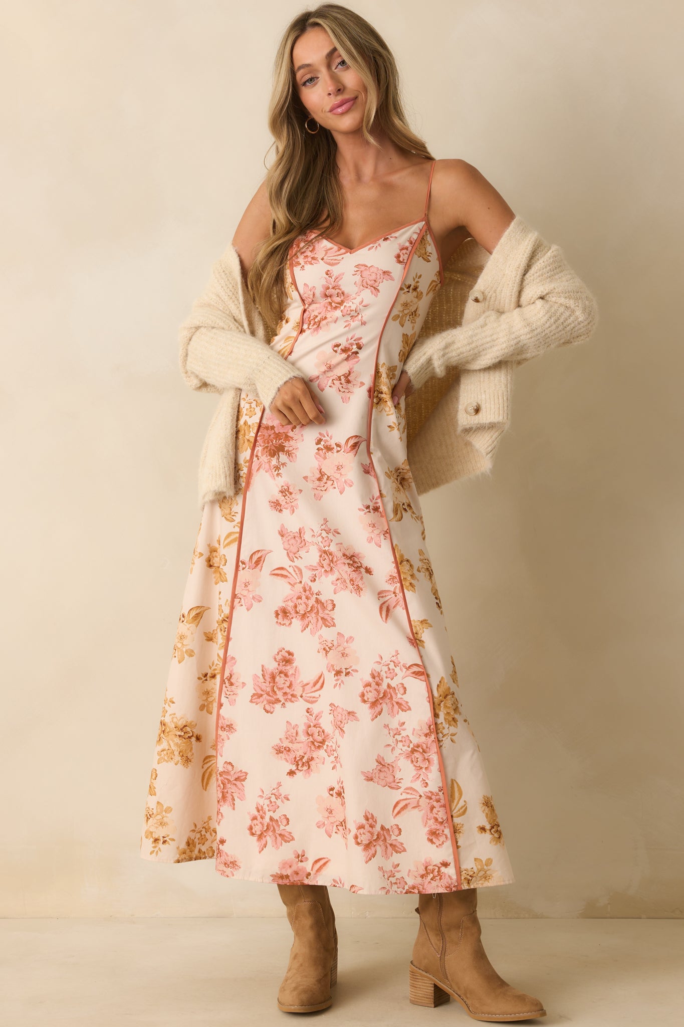 A front-facing angle highlighting the V-neckline and adjustable spaghetti straps.