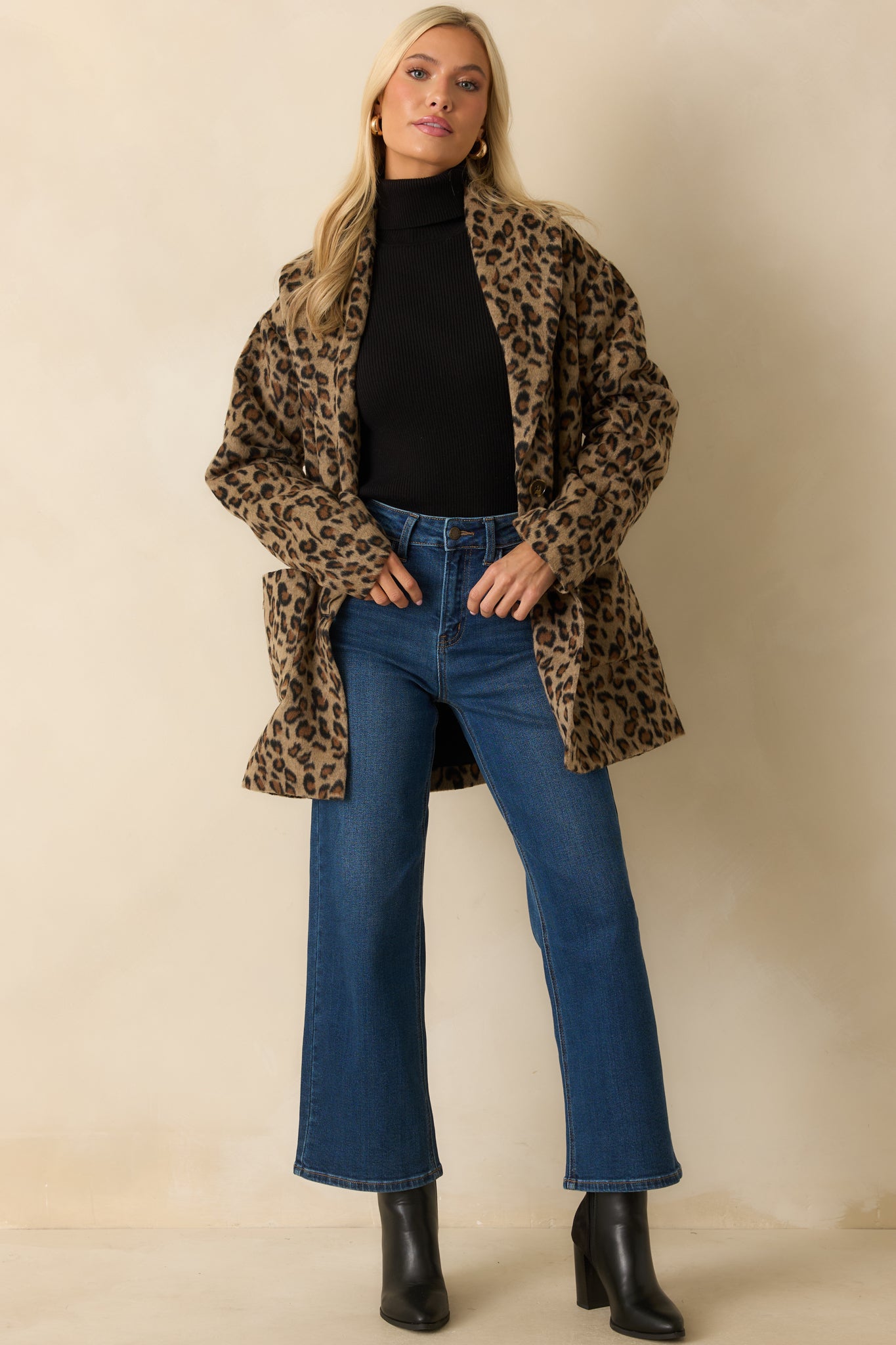 Front view of soft wool-blend coat featuring single-button closure and patch pockets.