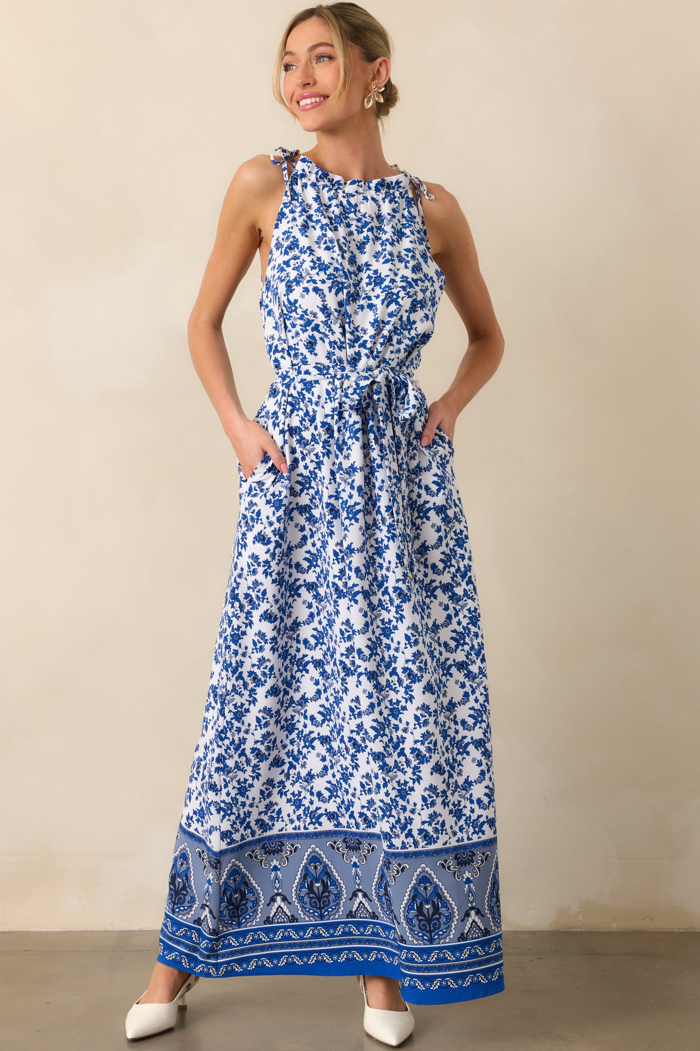 Frontal shot of the dress highlighting the delicate blue floral pattern and casual, structured silhouette.