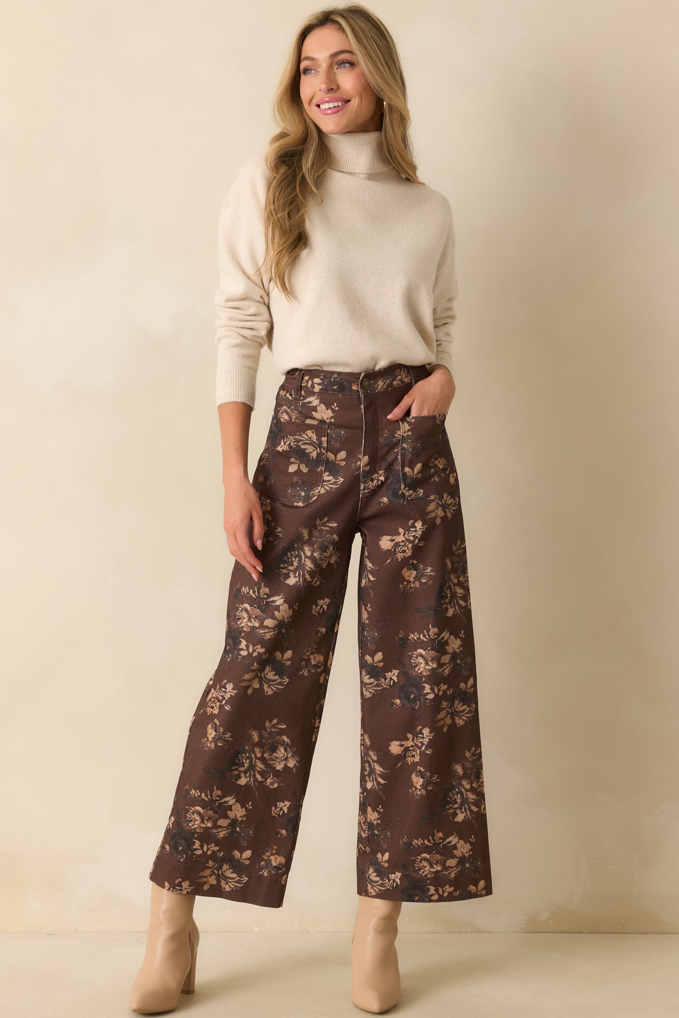 A full body angle highlighting the allover floral print and structured high-rise fit.