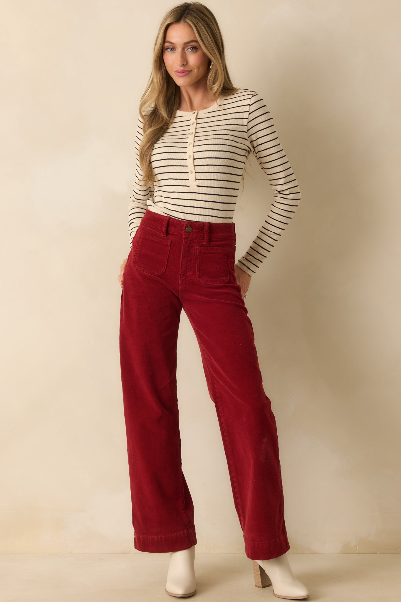 Full body front view emphasizing the fitted shape and classic Henley style.