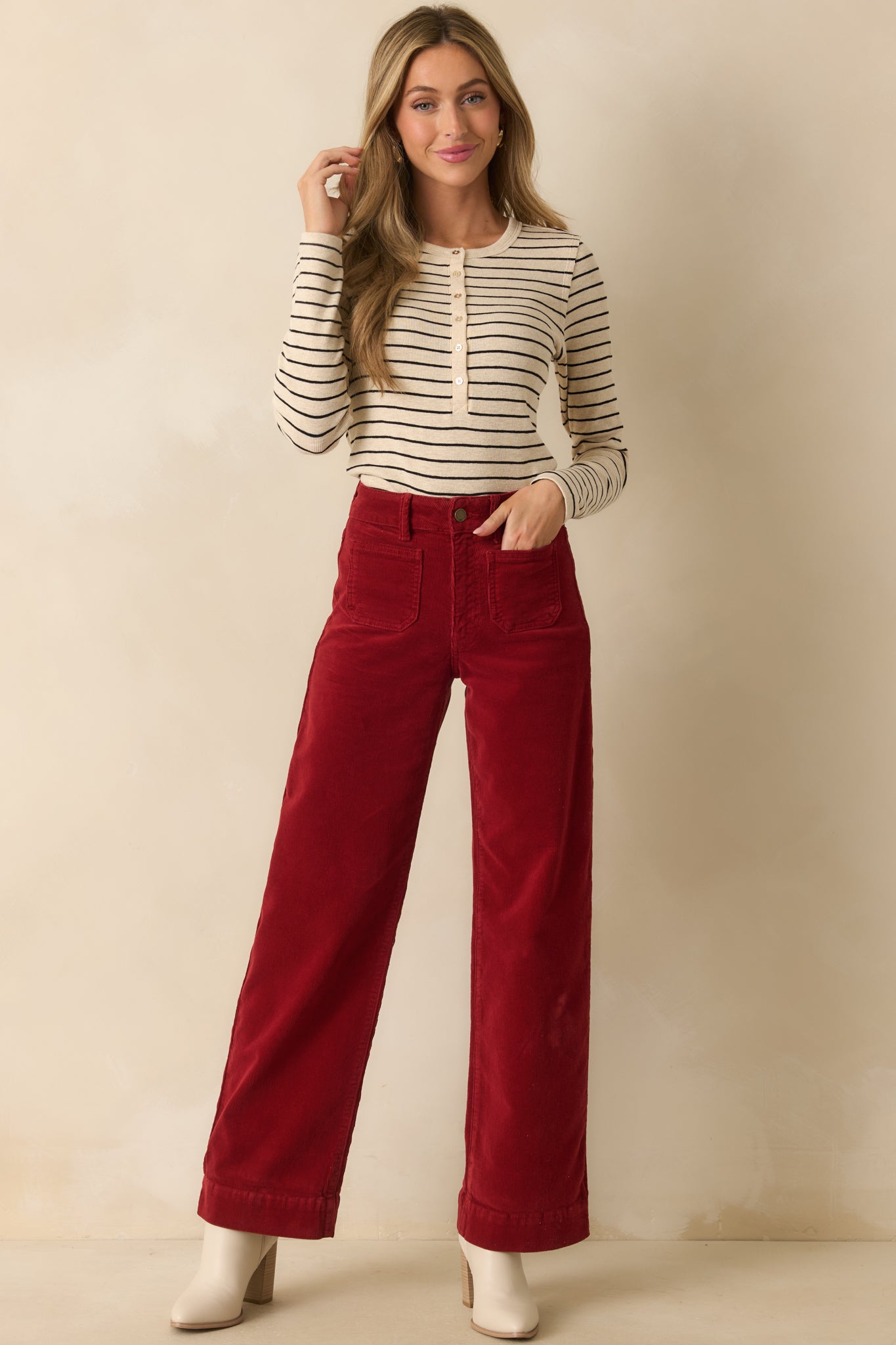 Full body front view showcasing the soft ribbed knit texture and horizontal stripe pattern.