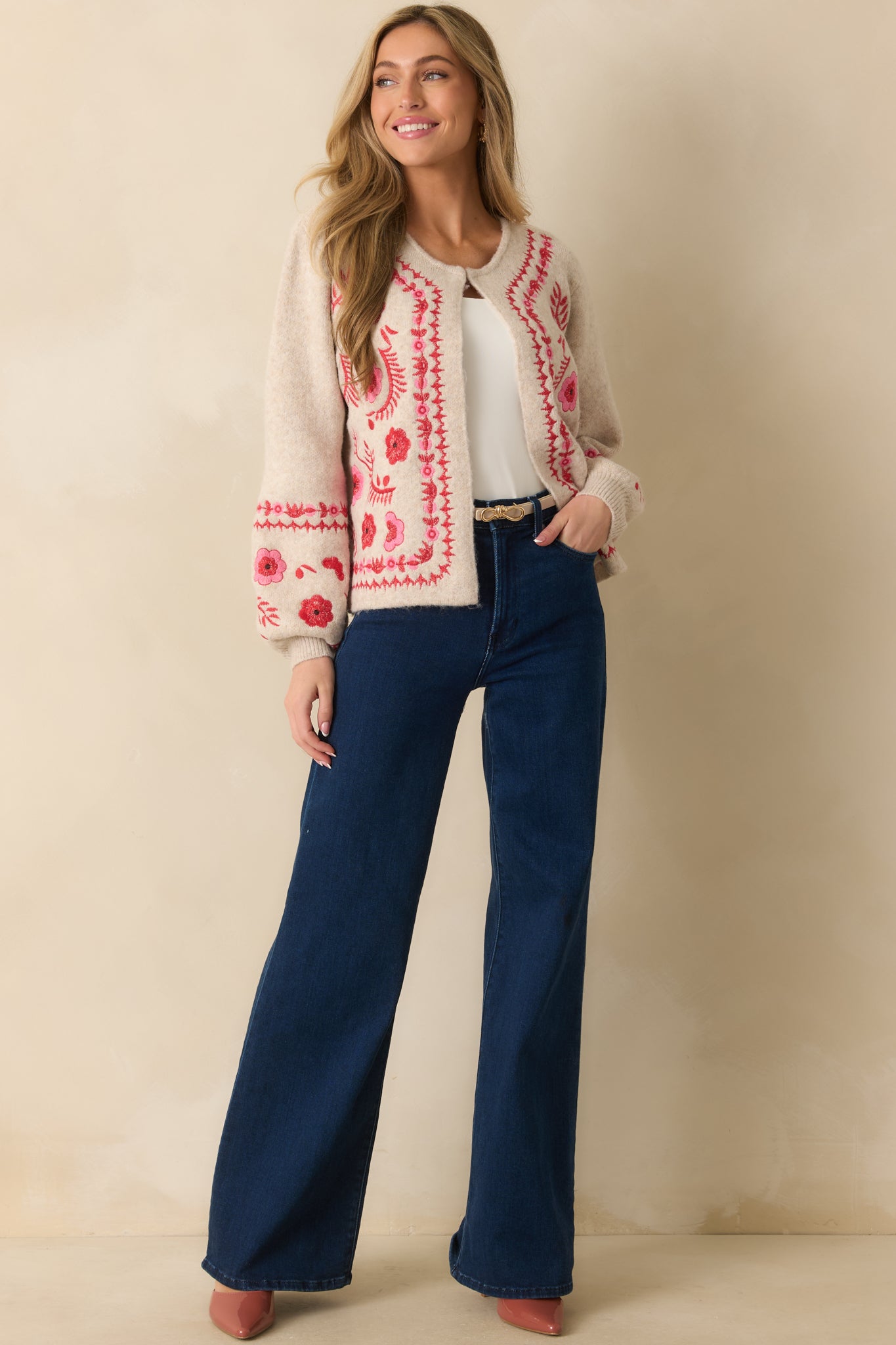 Full body front view showing the overall floral embroidery pattern across the cardigan.