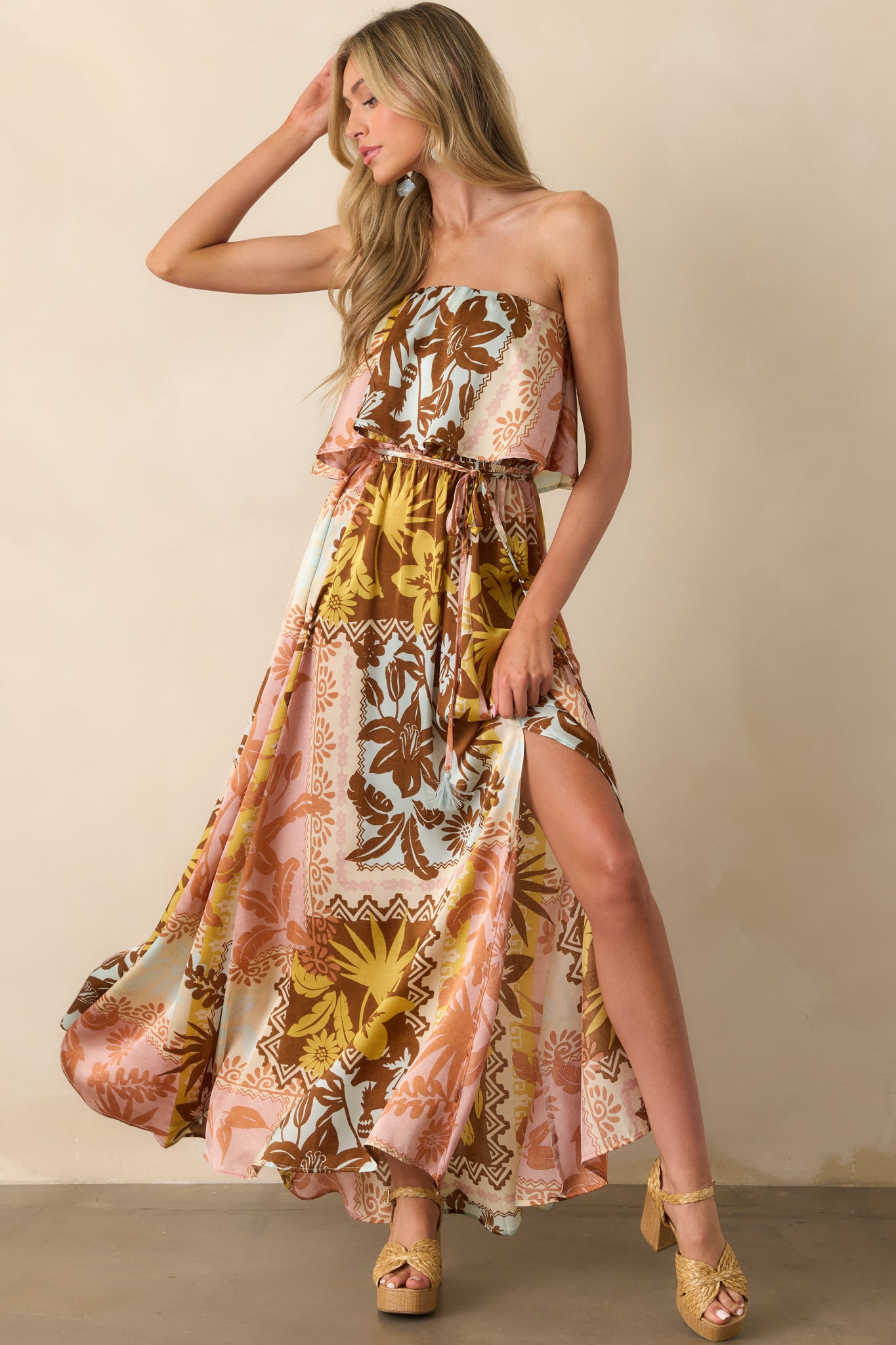 Full body centered view emphasizing the flowy silhouette and vibrant patchwork design from top to hem.