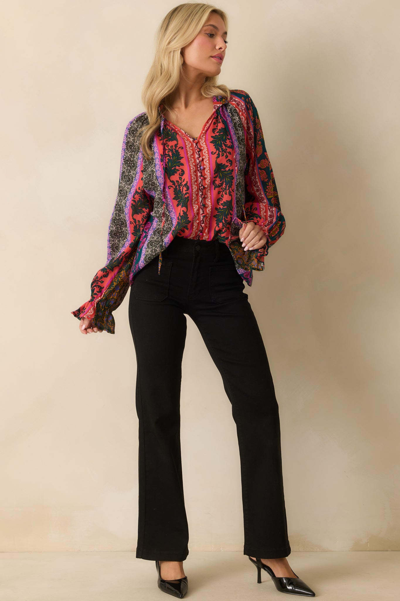 A full body shot emphasizing the optional self-ties at the neckline and flowing hem.