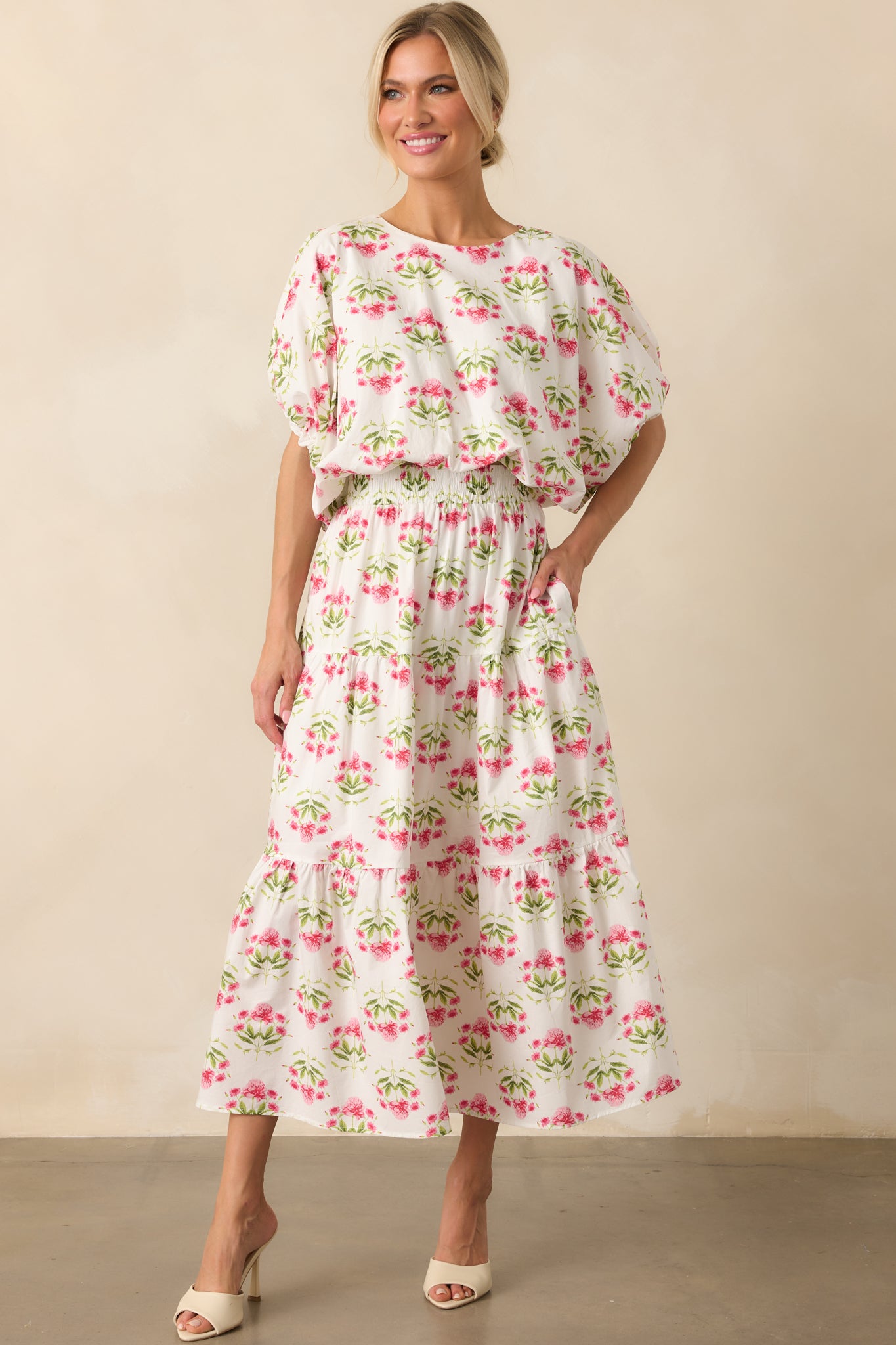 Full-length image of the top, emphasizing the soft silhouette and gathered detail at the bottom hem.