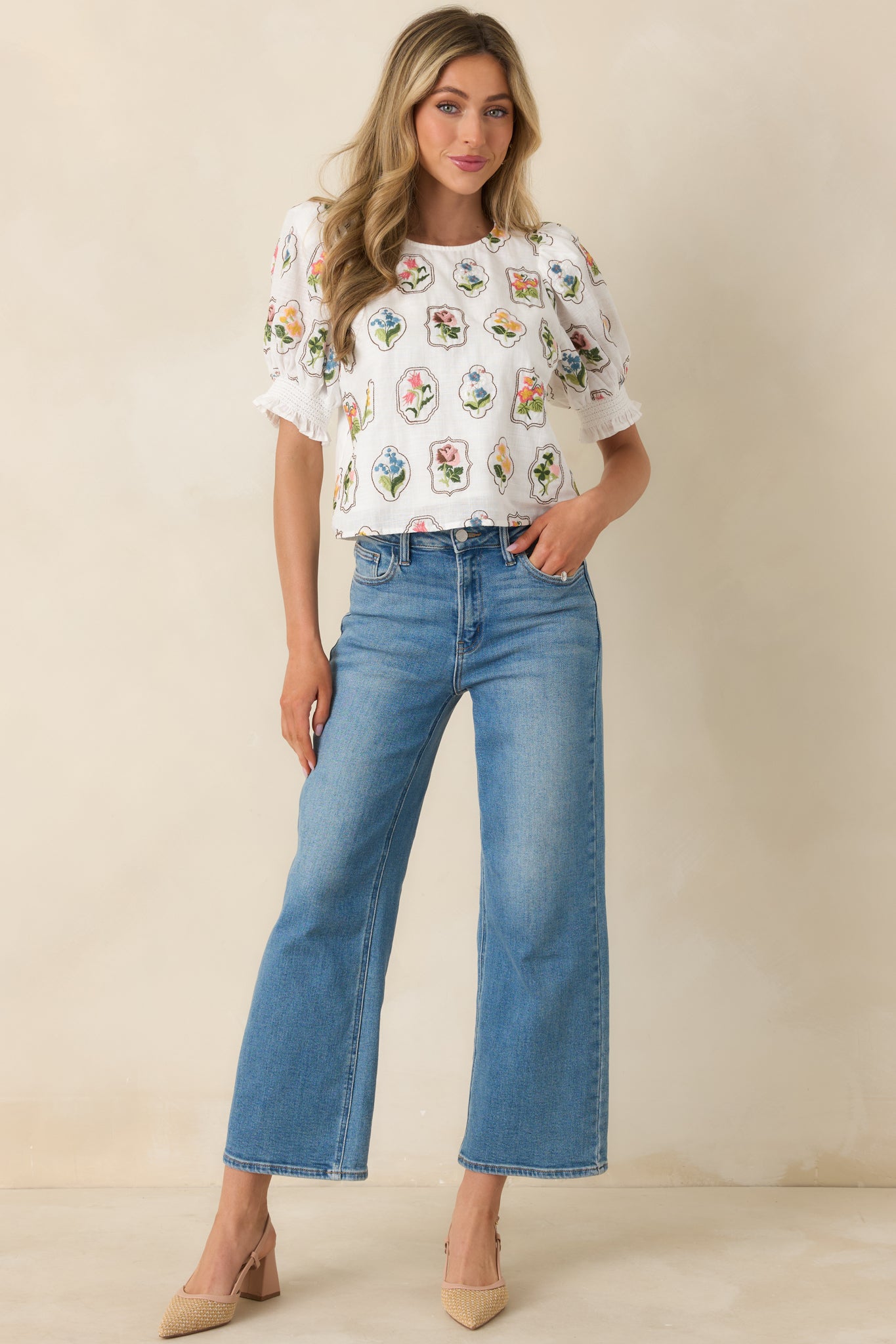 Front-facing full body image showcasing the lightweight woven fabric and allover multicolor floral embroidery.