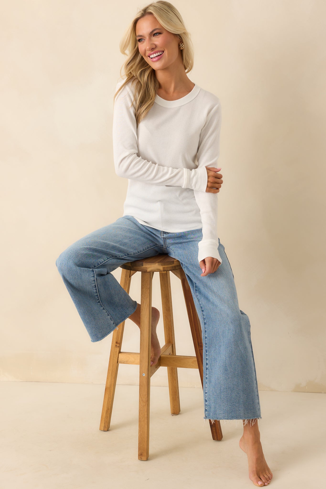 Full body front-facing image showcasing the clean lines of the crew neck and straight hem.