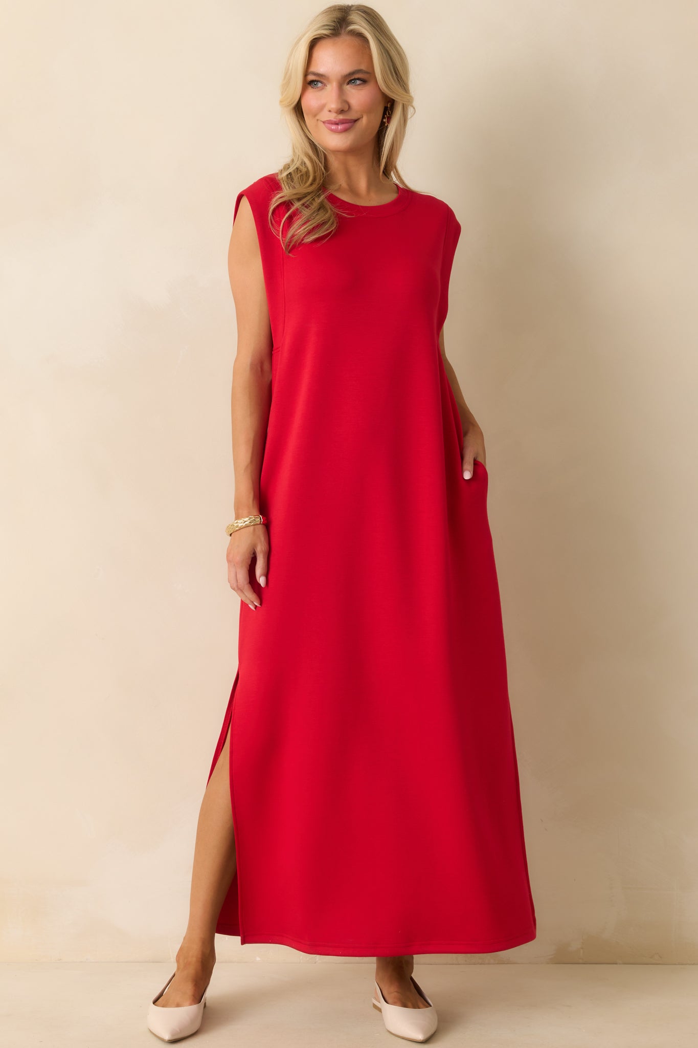 Full-length dress highlighting the relaxed shape and side slit details.