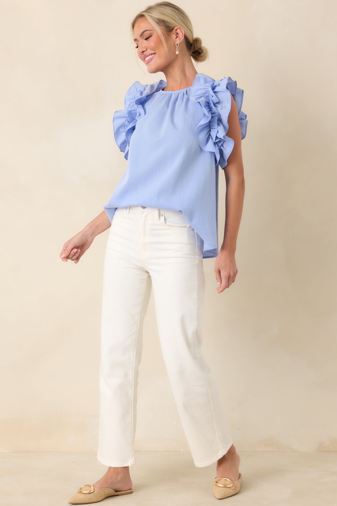 Full-length front view of white jeans with classic five-pocket design and clean straight silhouette.