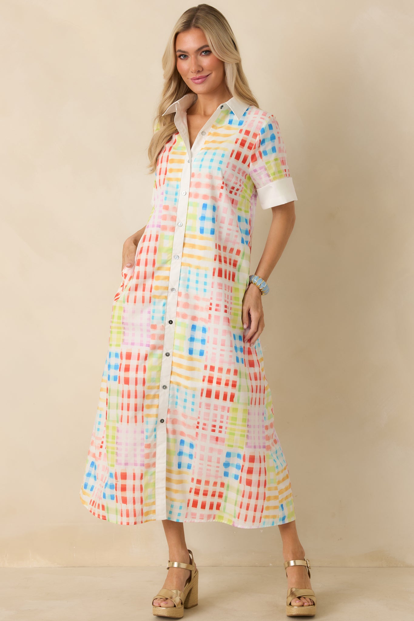 Maxi dress displayed full length, highlighting classic shirt dress silhouette and flowing hem.