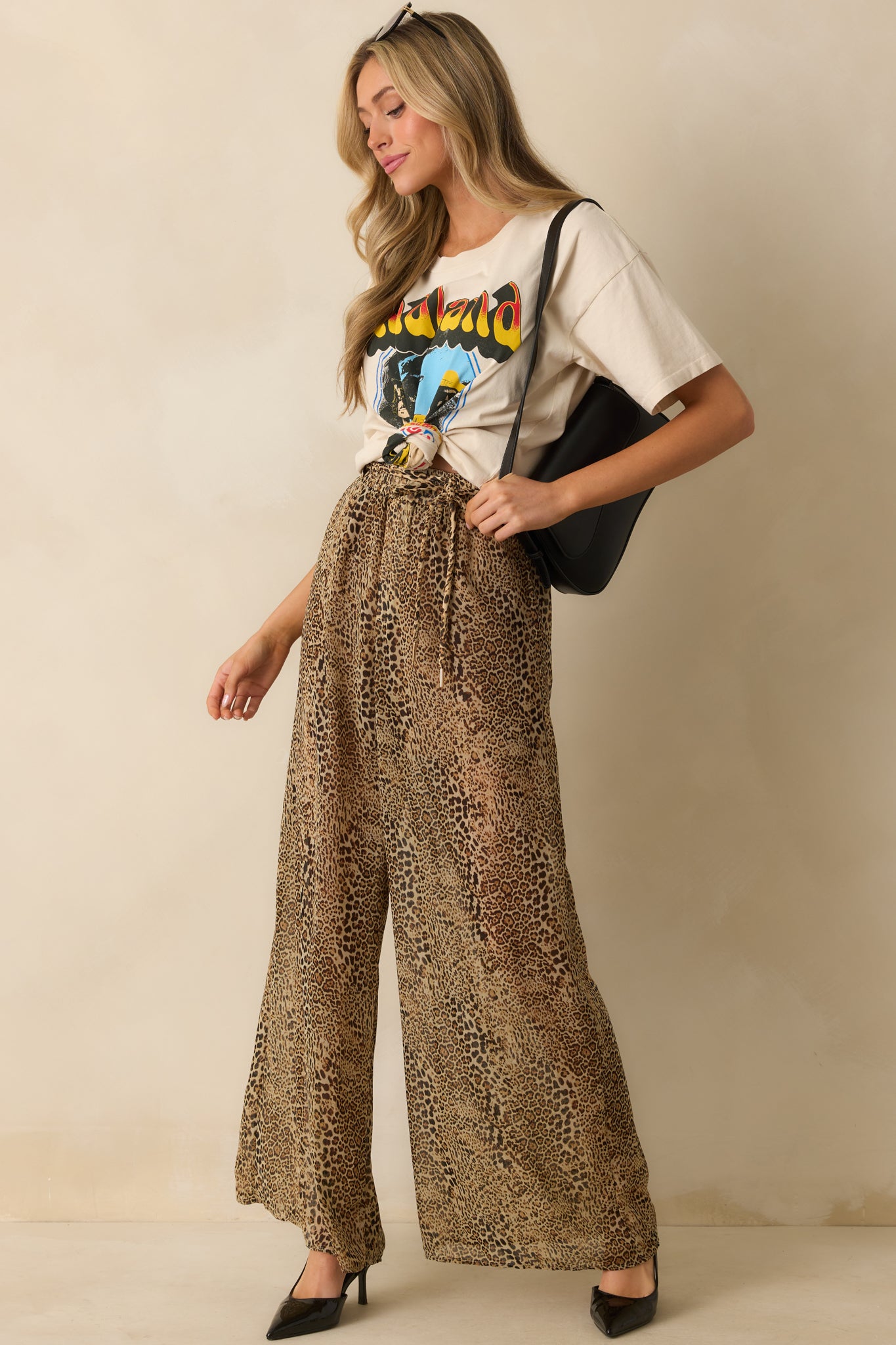 A full-length side shot highlighting the adjustable self-tie belt and chiffon overlay.