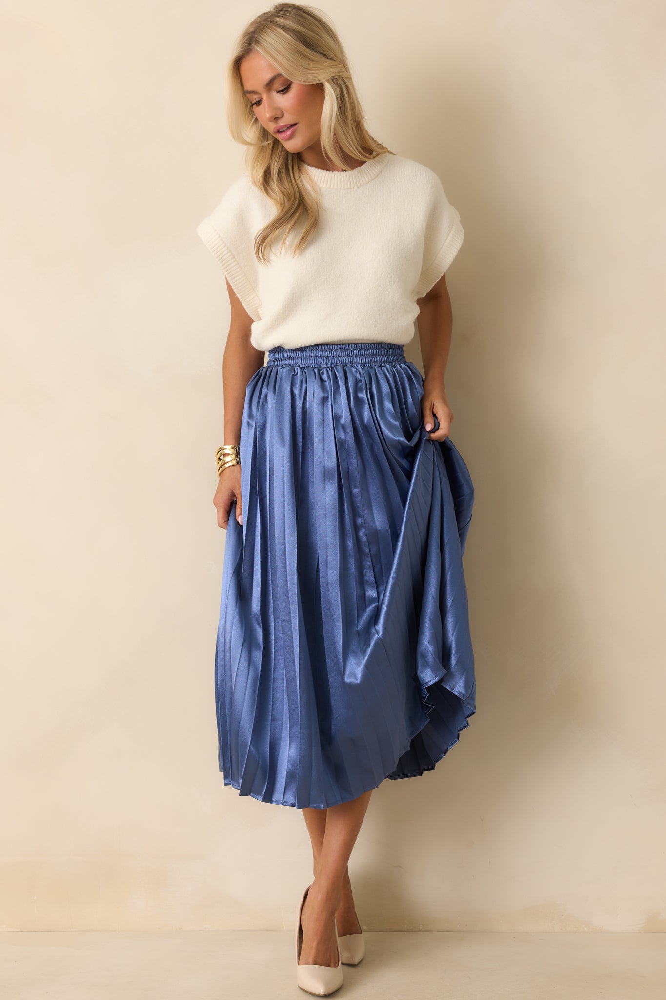Another full-length shot showing the smooth waistband and midi-length hem.