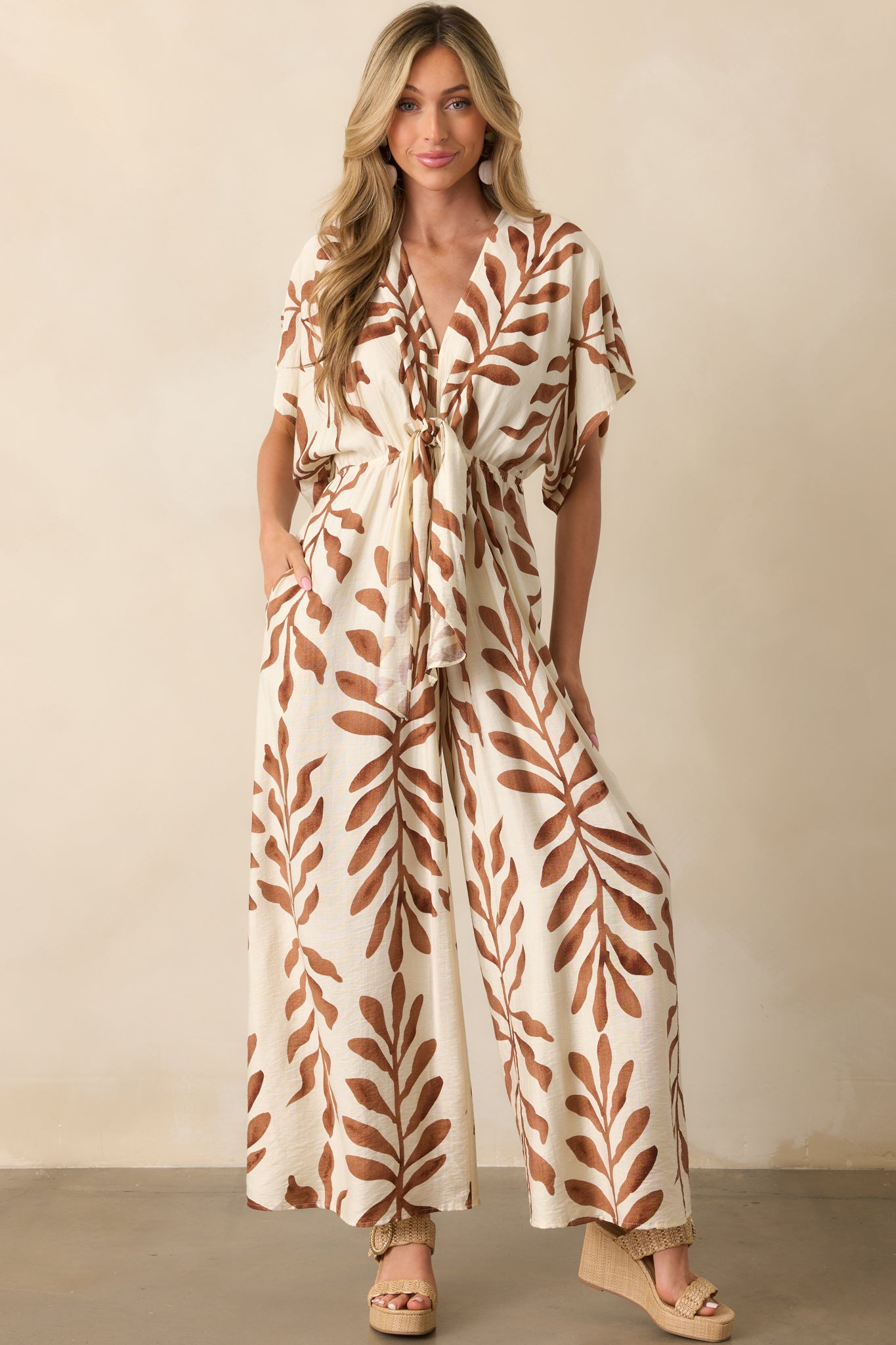 Full body front-facing shot focusing on the overall structure, from neckline to hem, including the functional pockets.