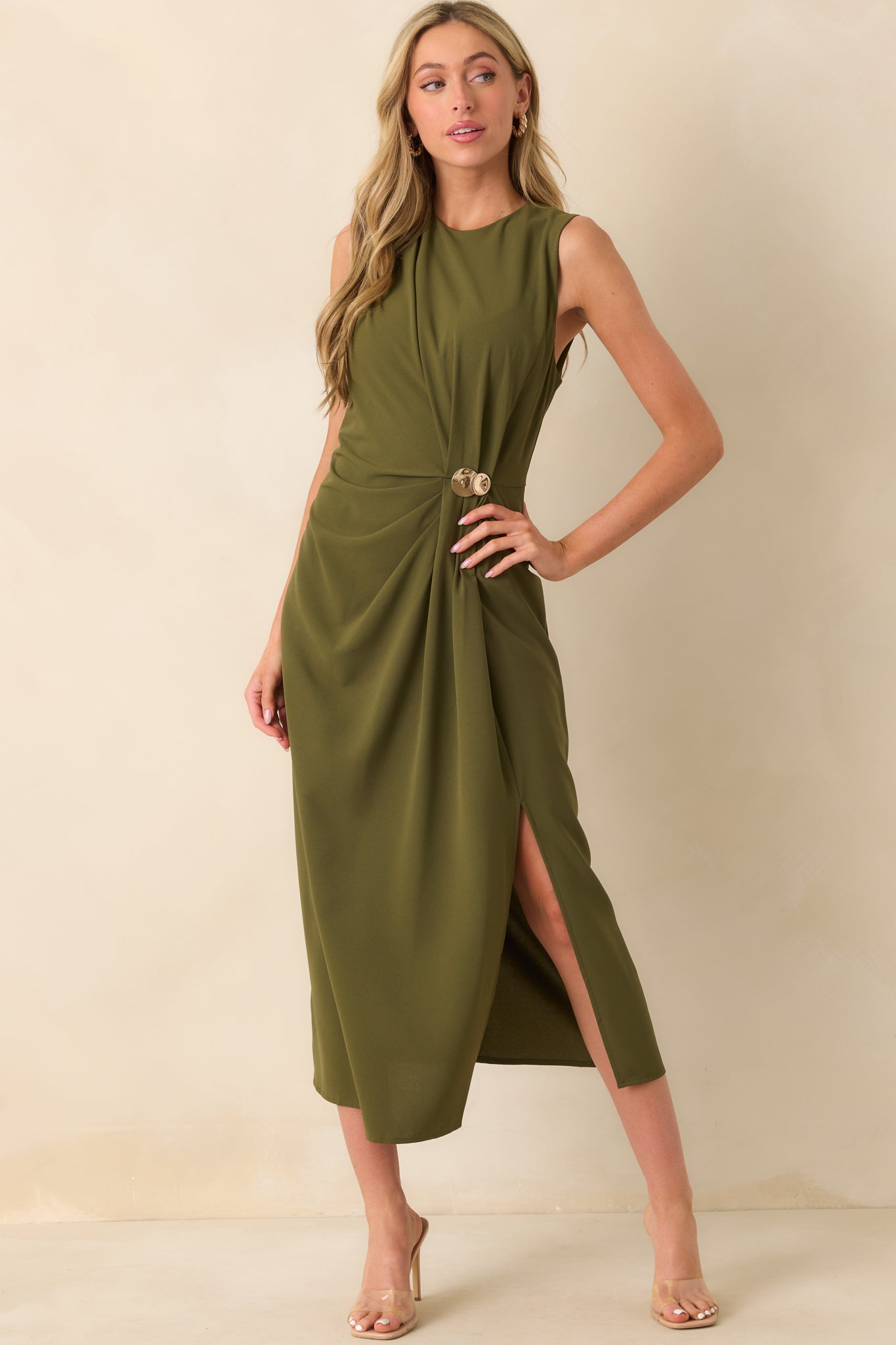A full body front angled view highlighting the ruched texture down the front of the dress.