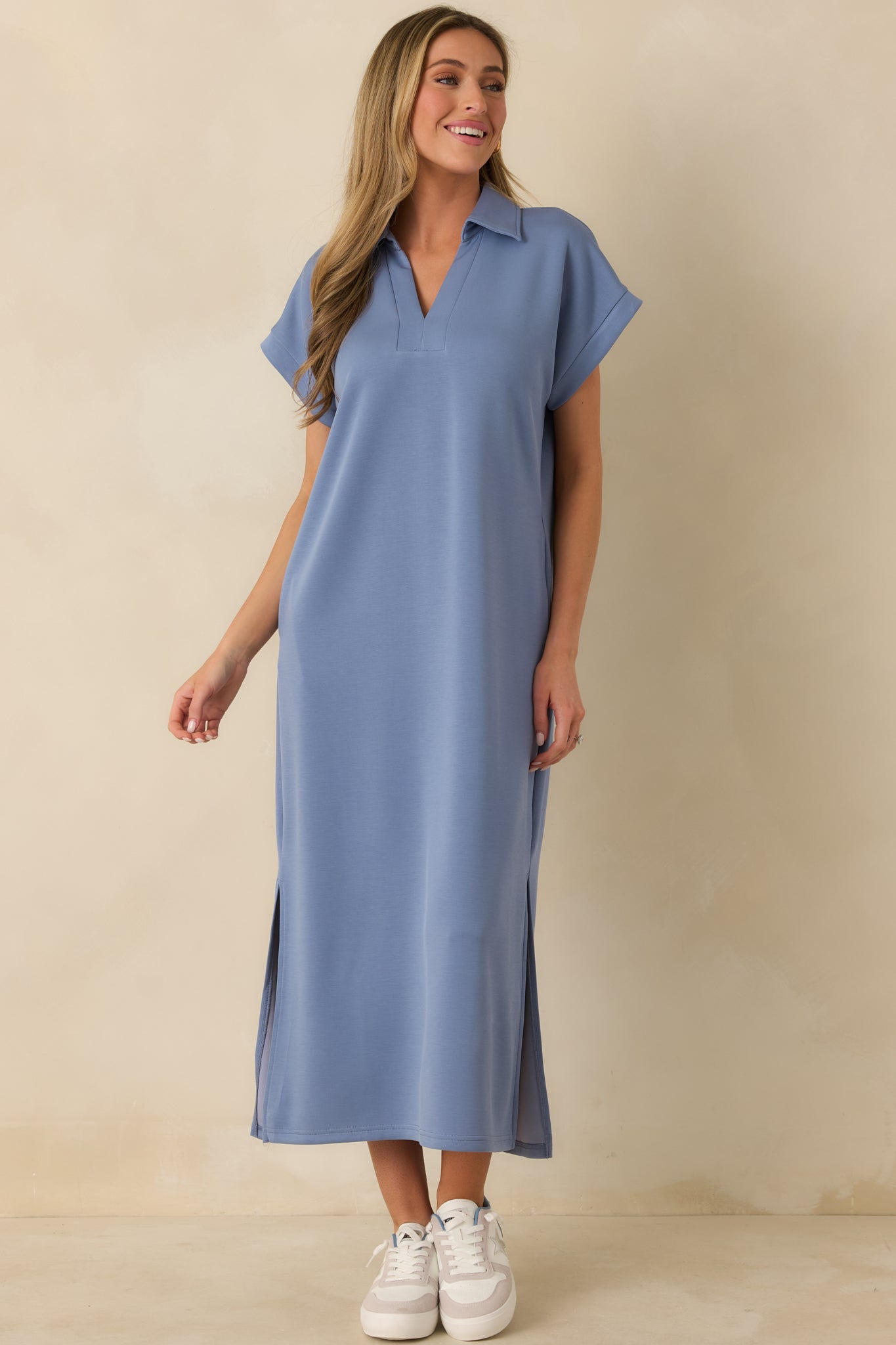 Full-length front view showcasing the soft fabric, short sleeves, and side slits for ease of movement.