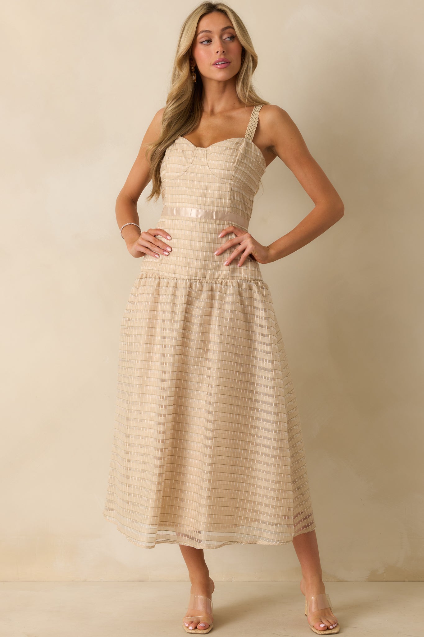 Full view of the tan dress with sweetheart neckline and embroidered adjustable straps, shown front facing.