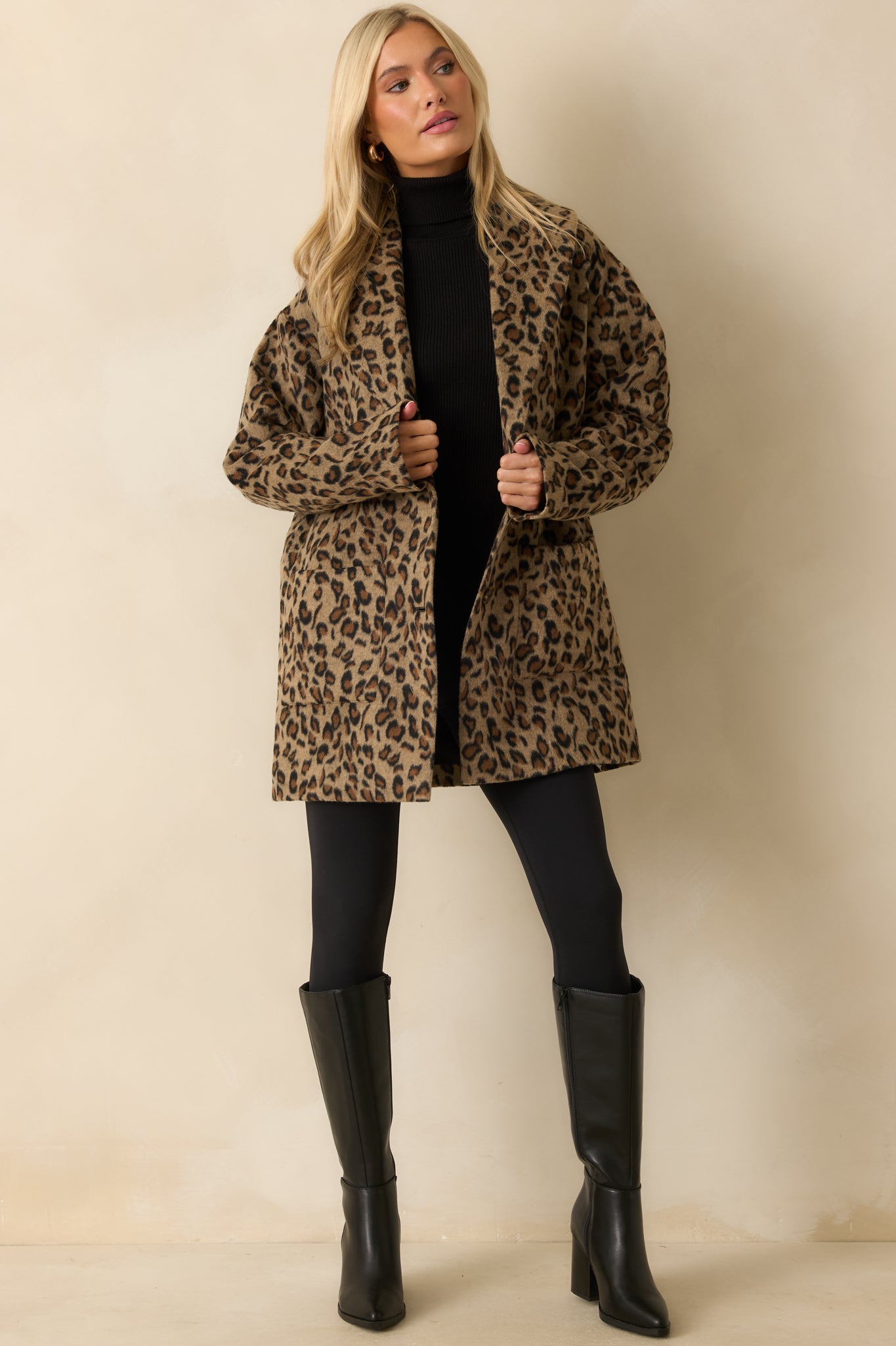Full view of tan leopard print longline coat showcasing its soft wool-blend fabric, notched collar, and easy, relaxed silhouette.