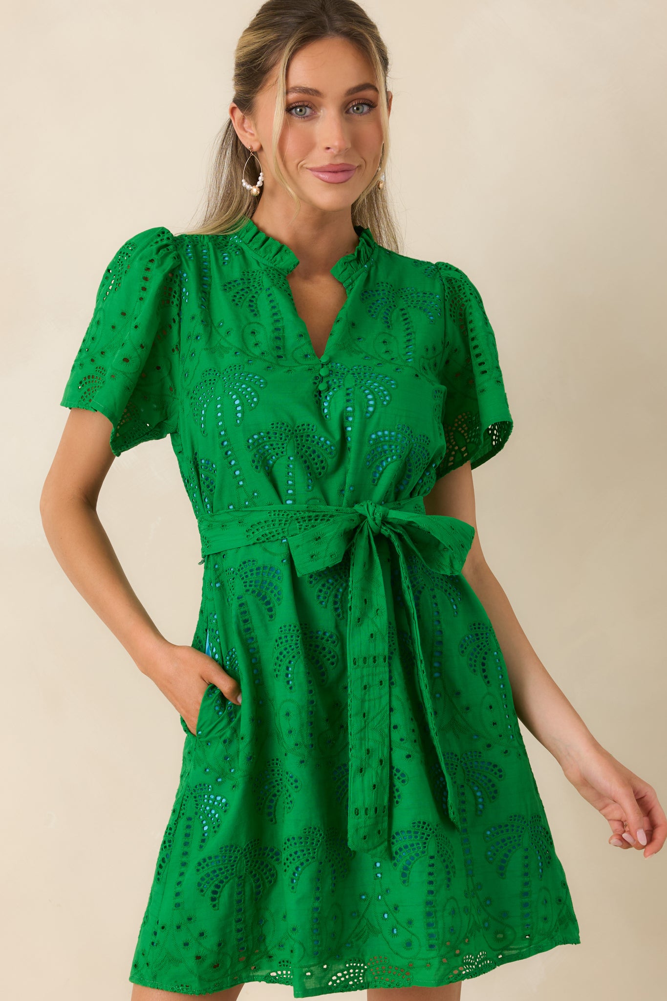 Functional side pocket detail with coordinating sky blue lining.