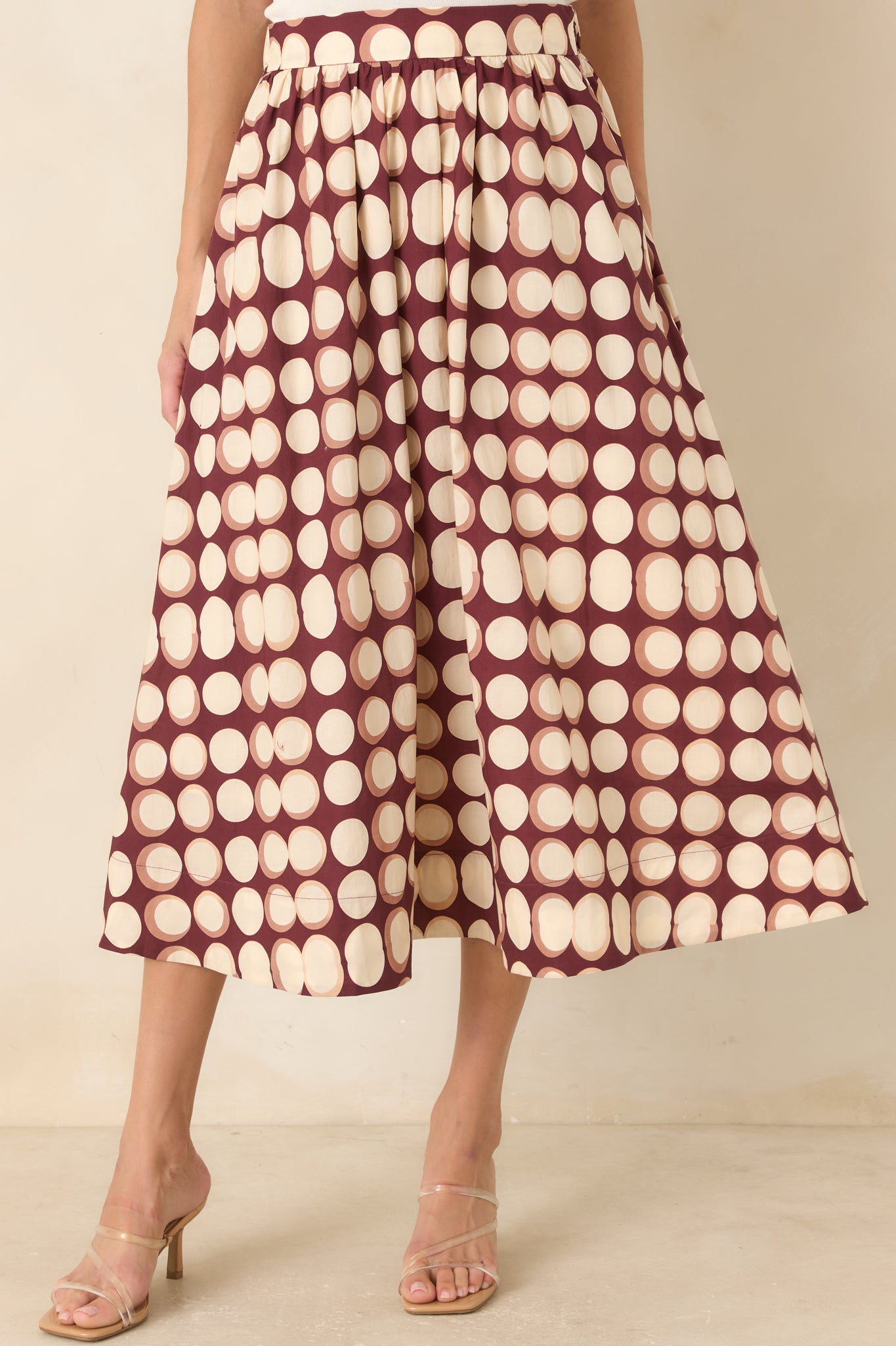 Detailed view of the cotton skirt showcasing the gathered texture, full A-line shape, and convenient side pocket.