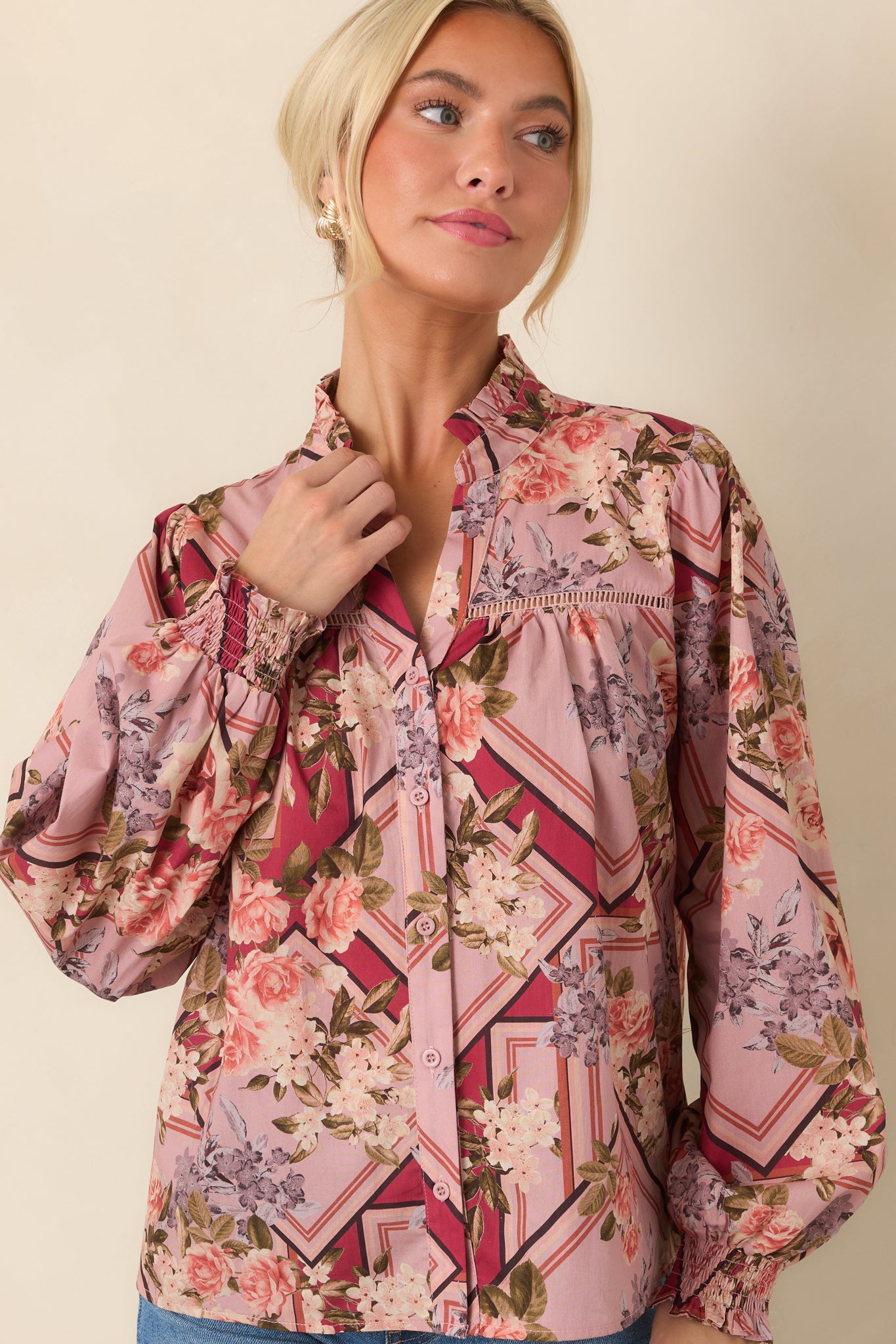 Upper portion of the blouse showcasing the gathered yoke, ruffled neckline, and voluminous long sleeves.