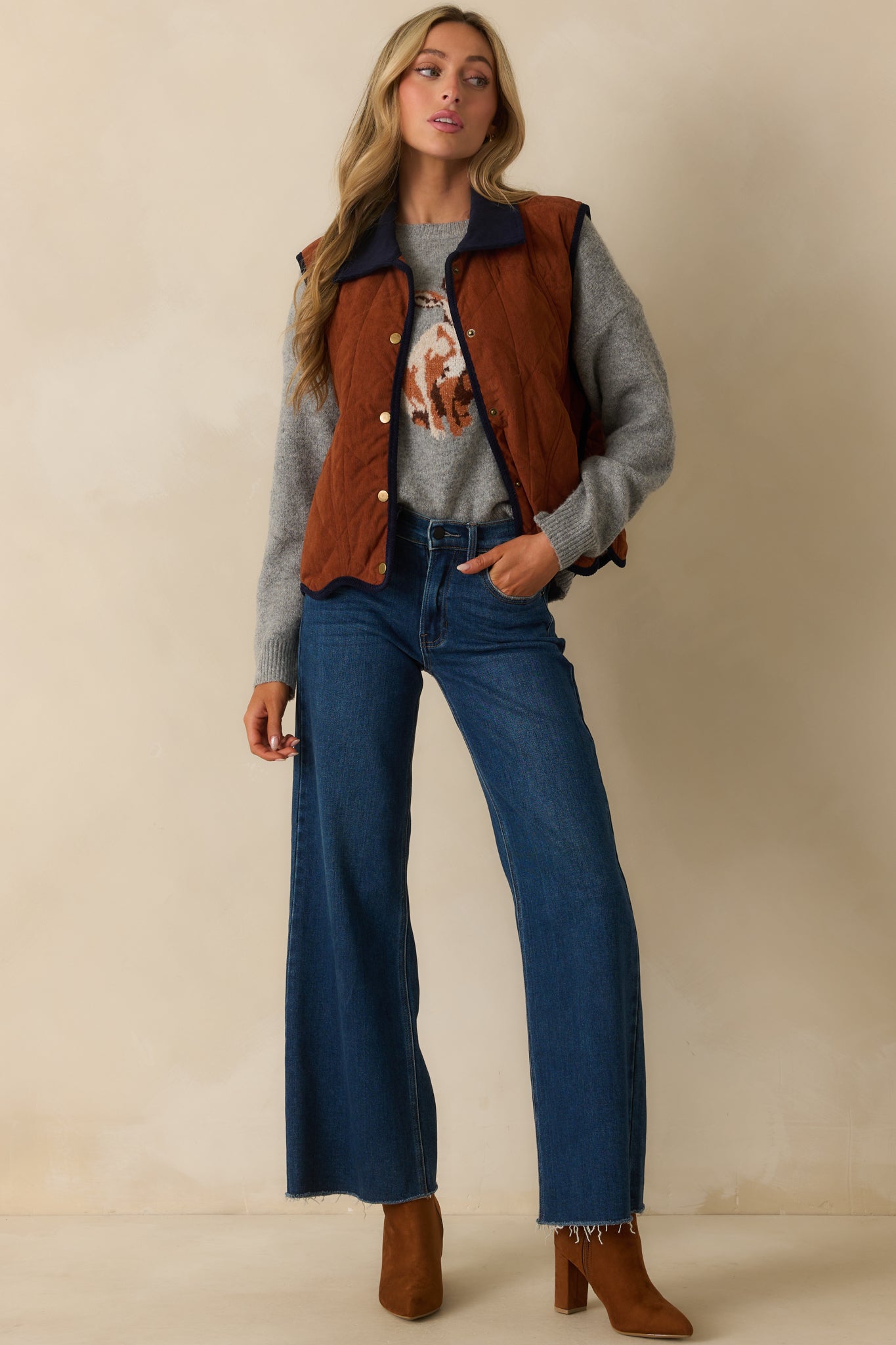 Ginger brown corduroy quilted vest with diamond stitching and contrast navy collar.