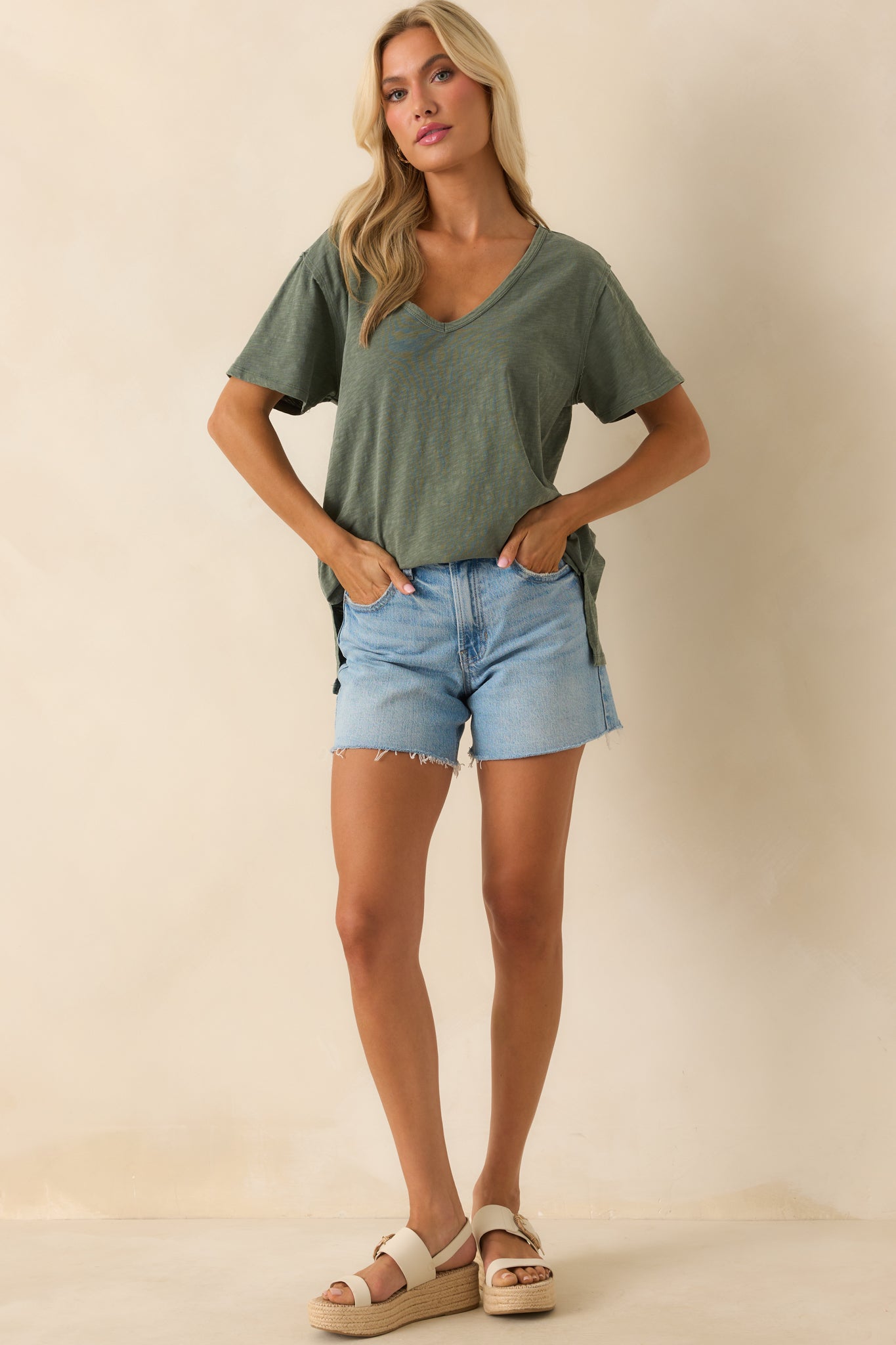 A full body image highlighting the tee’s lightweight cotton fabric and short sleeves.